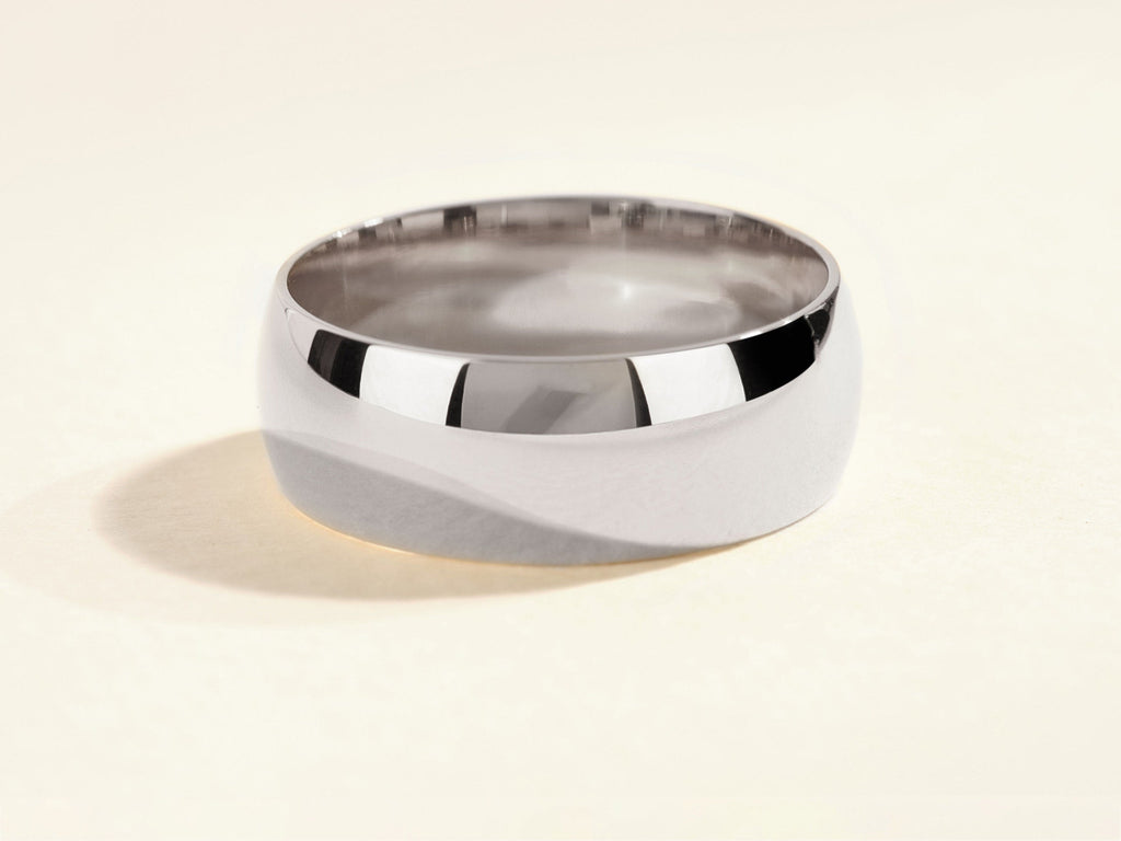 Polished Finish Setting Men's Wedding Band.