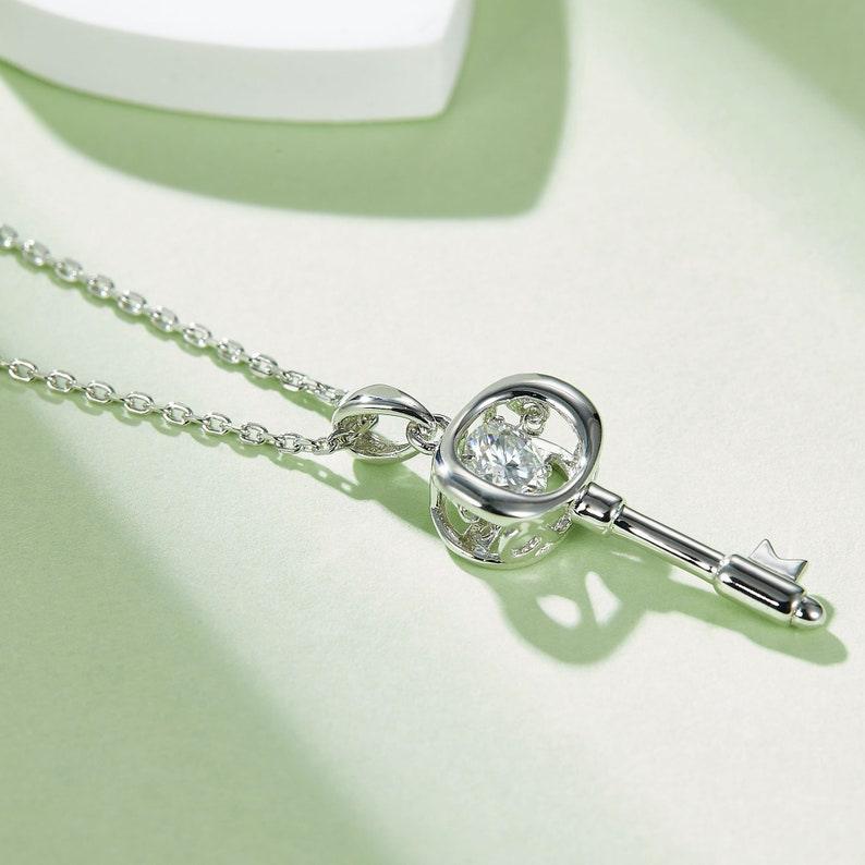 Captivating Key Brilliance: 0.5ct 5mm round Moissanite Necklace with Elegant Key-Shaped