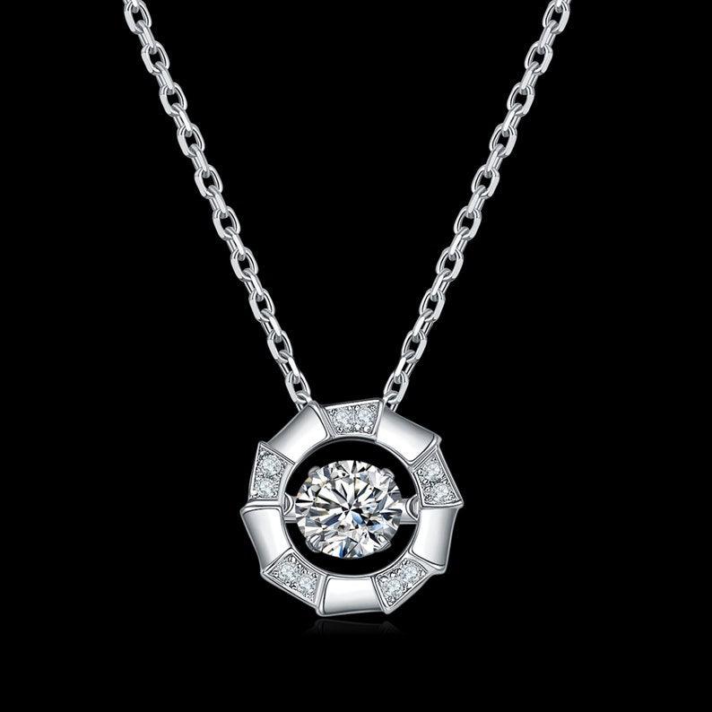 Celestial Embrace: 5mm Round 0.5ct Moissanite Halo Pendant