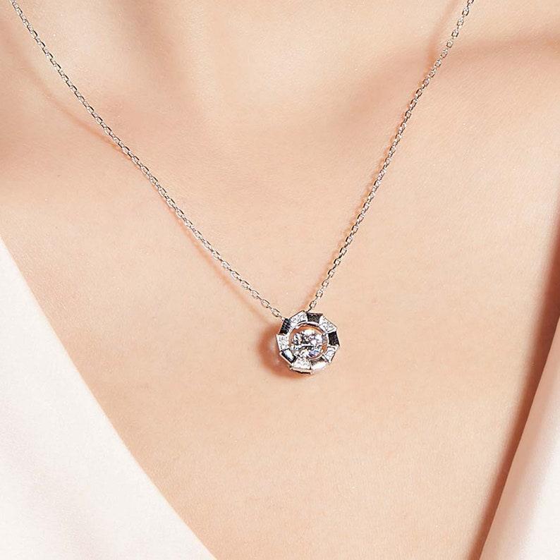 Celestial Embrace: 5mm Round 0.5ct Moissanite Halo Pendant