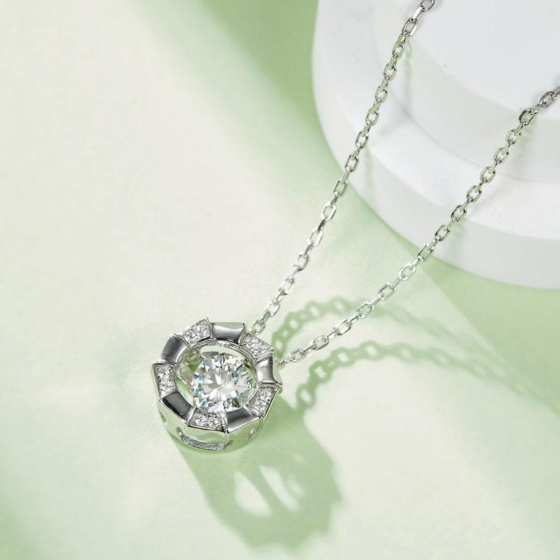 Celestial Embrace: 5mm Round 0.5ct Moissanite Halo Pendant