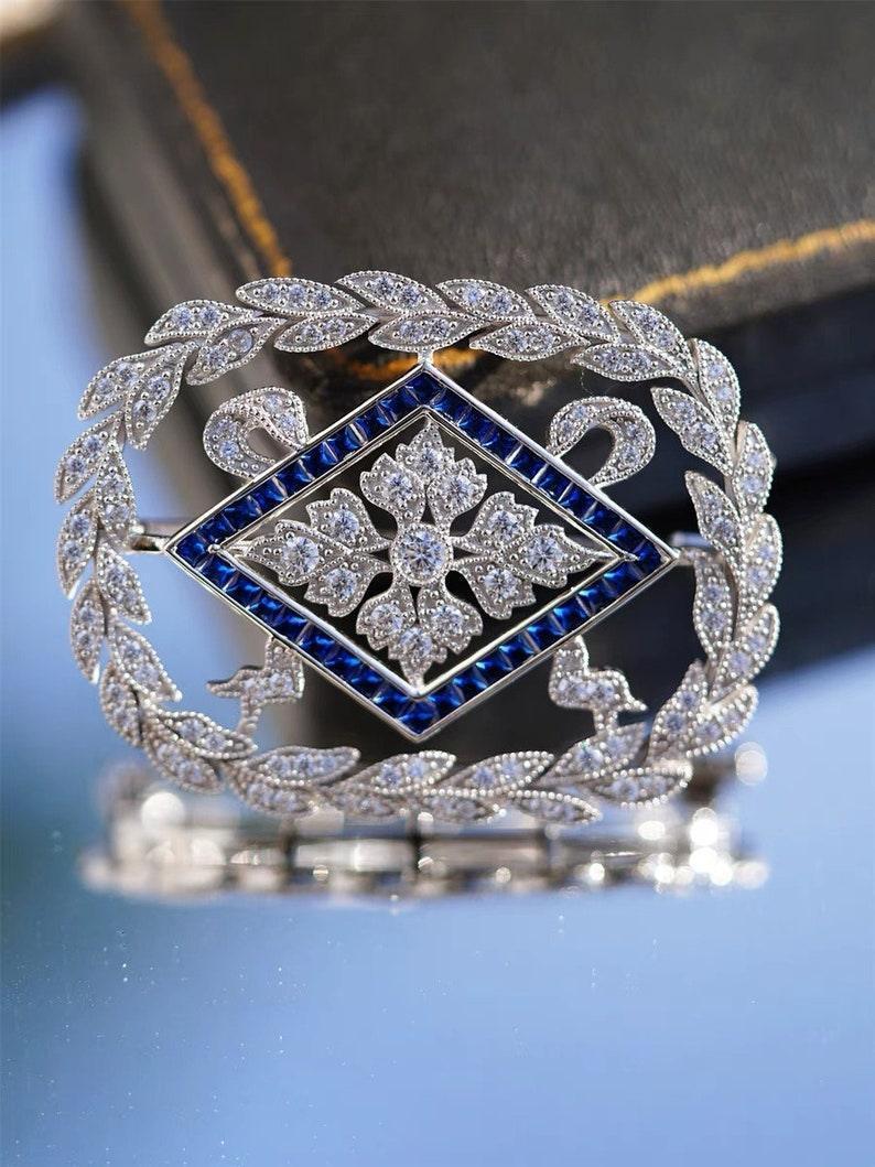 Art Deco Floral white and blue diamond brooch