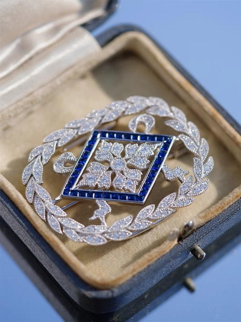 Art Deco Floral white and blue diamond brooch