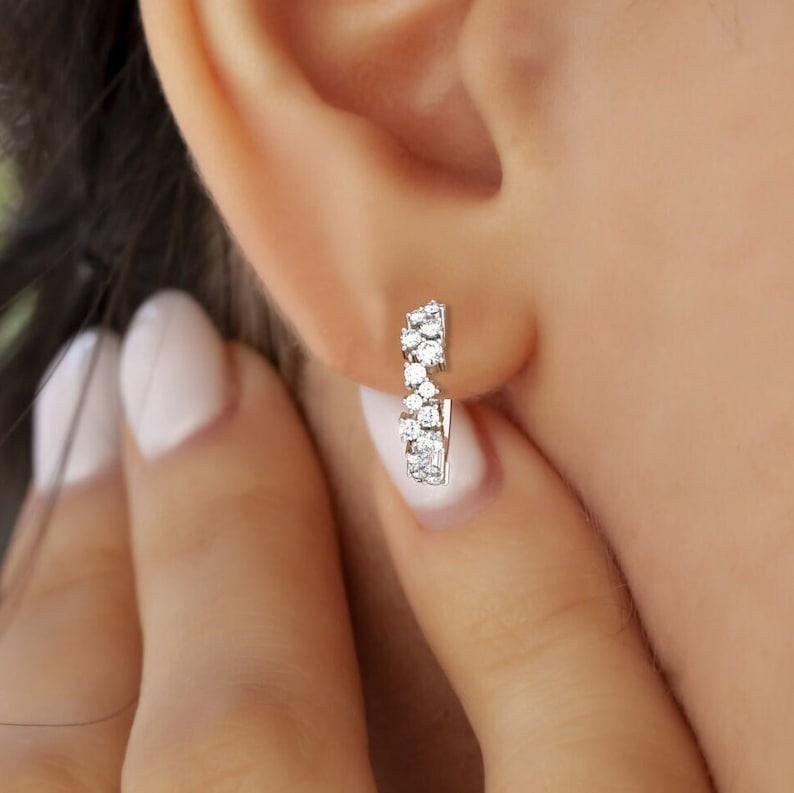 Excellent round diamond with cluster hoop earrings