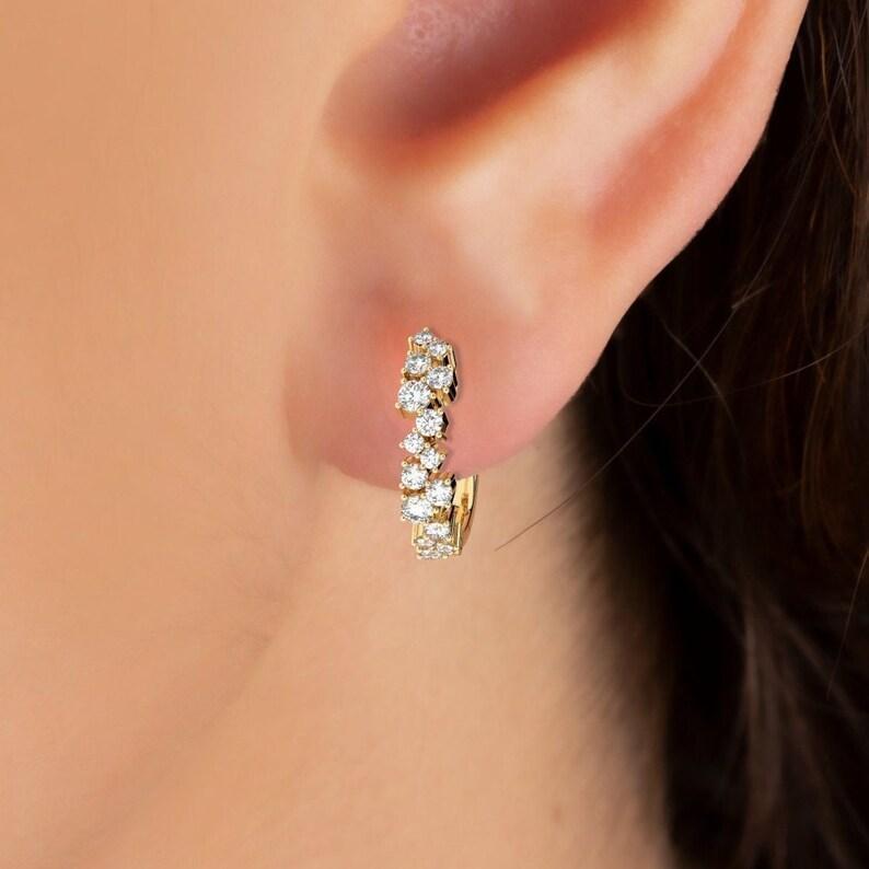 Excellent round diamond with cluster hoop earrings