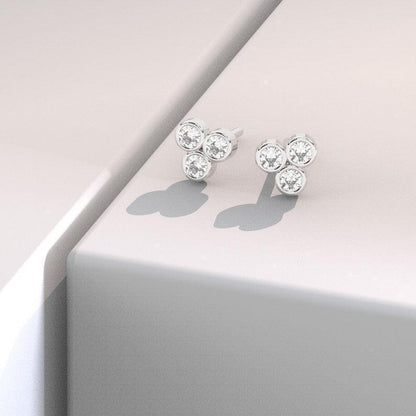 Trila Bezel Three Diamonds Stud Earrings