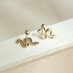 0.14 TCW Round Moissanite Diamond Snake Studs Earrings