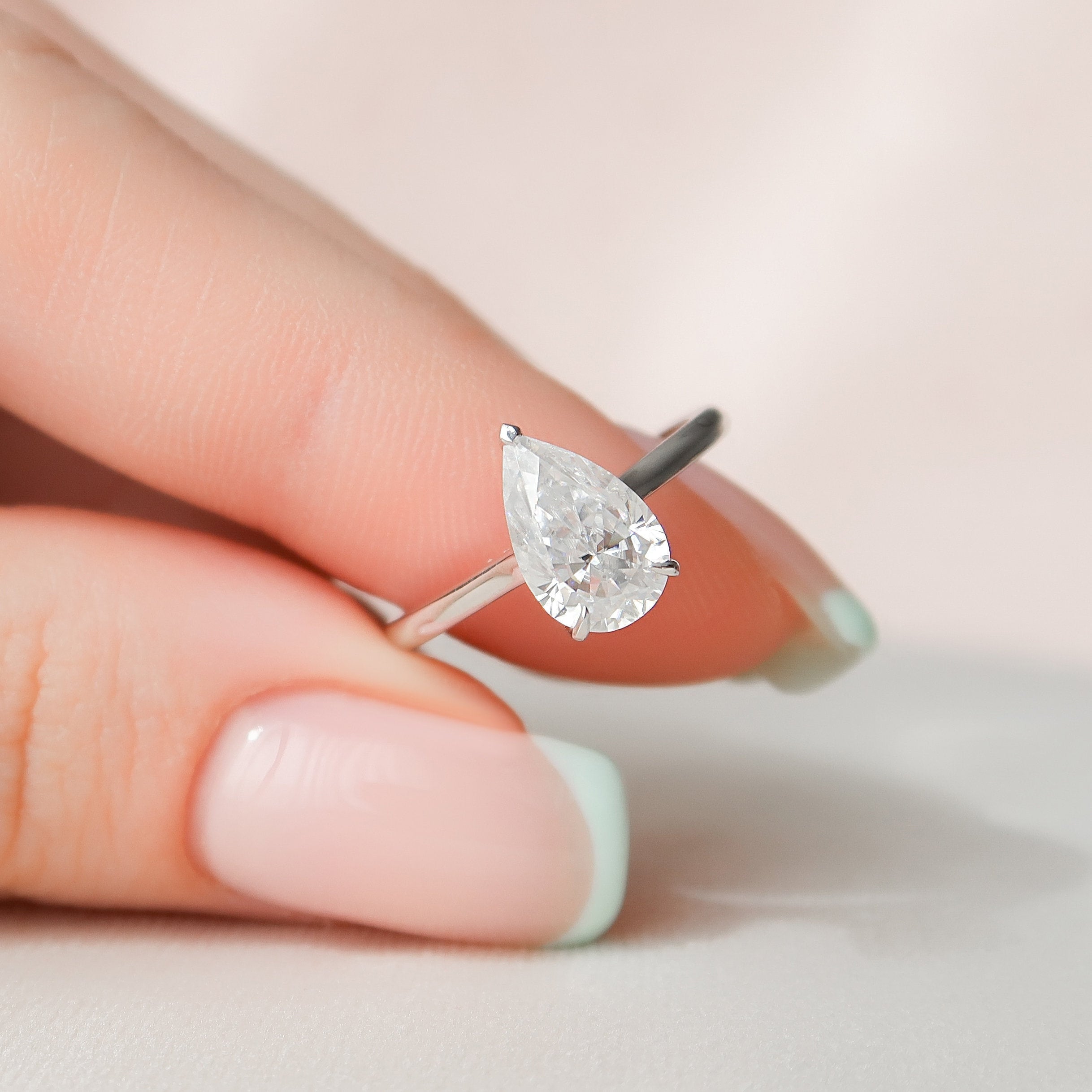 1.50 CT Pear Cut Moissanite Hidden Halo Engagement Ring