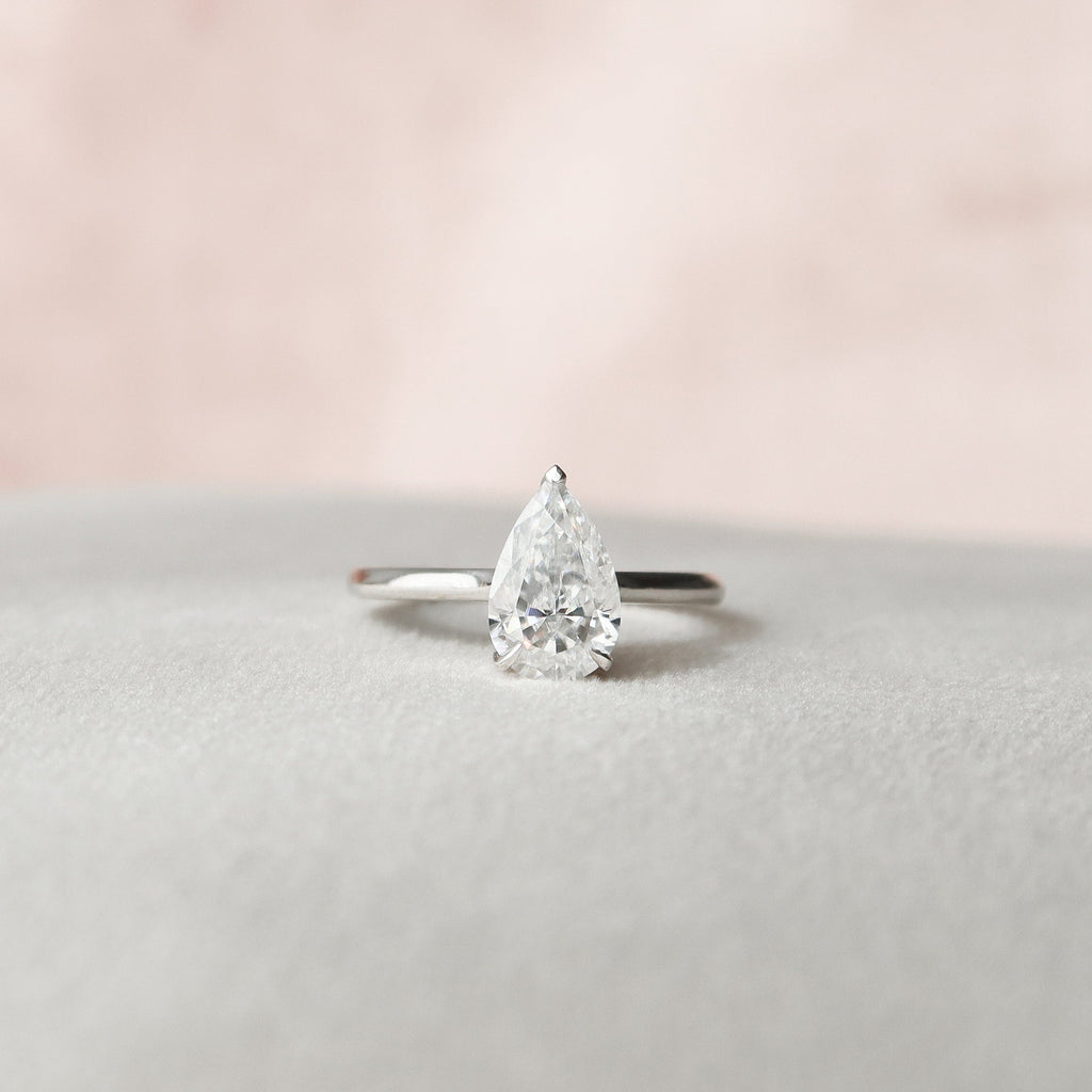 1.50 CT Pear Cut Moissanite Hidden Halo Engagement Ring