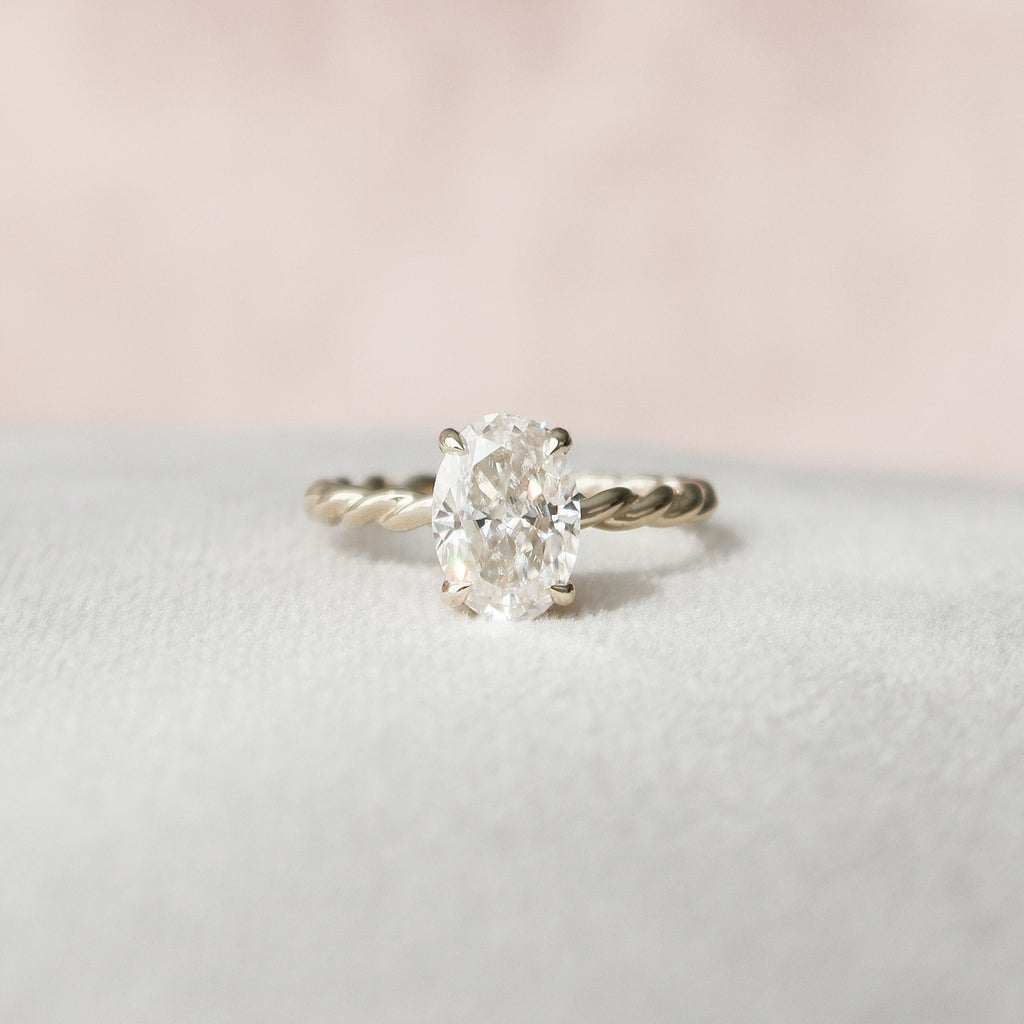 1.50 CT Oval Hidden Halo Twisted Band Moissanite Engagement Ring