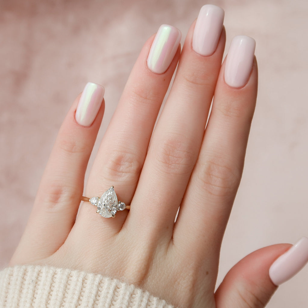 2.0 CT Pear Cut Moissanite Three Stone Engagement Ring