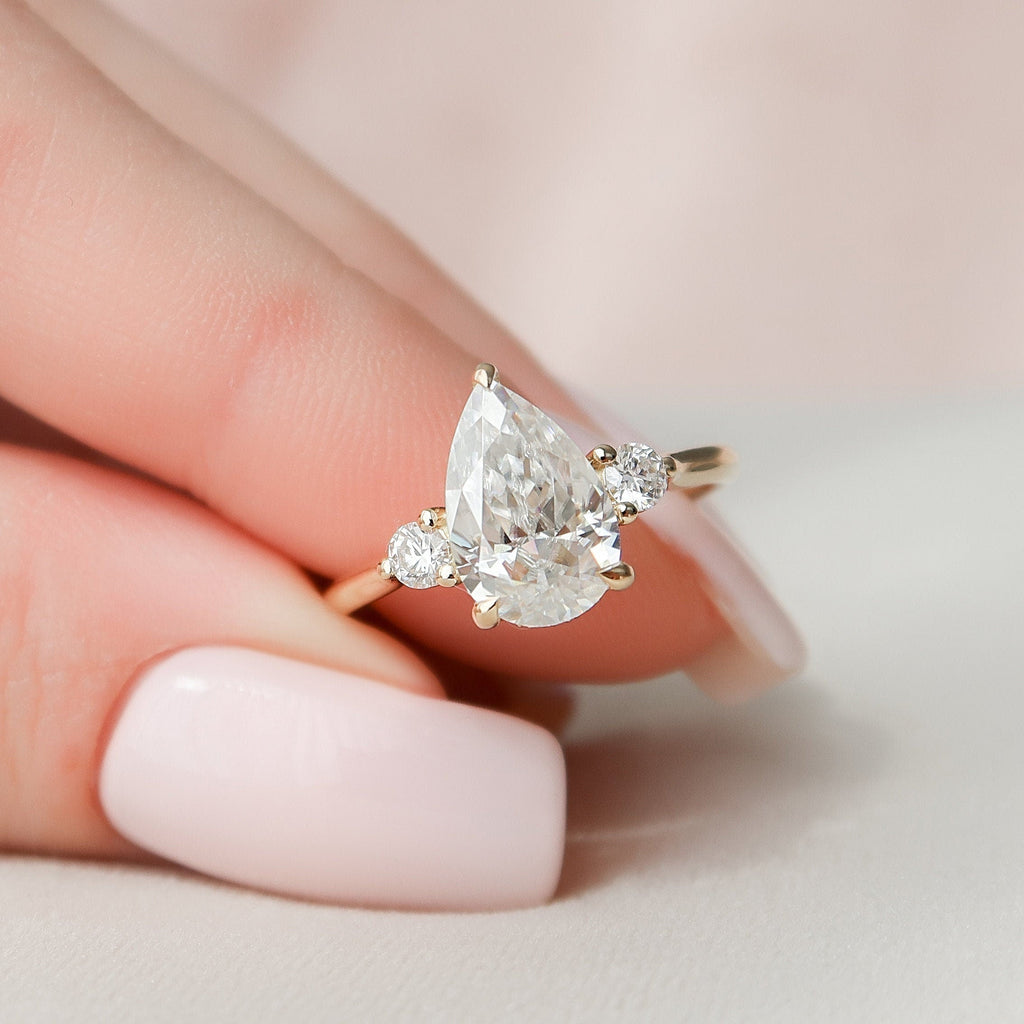 2.0 CT Pear Cut Moissanite Three Stone Engagement Ring