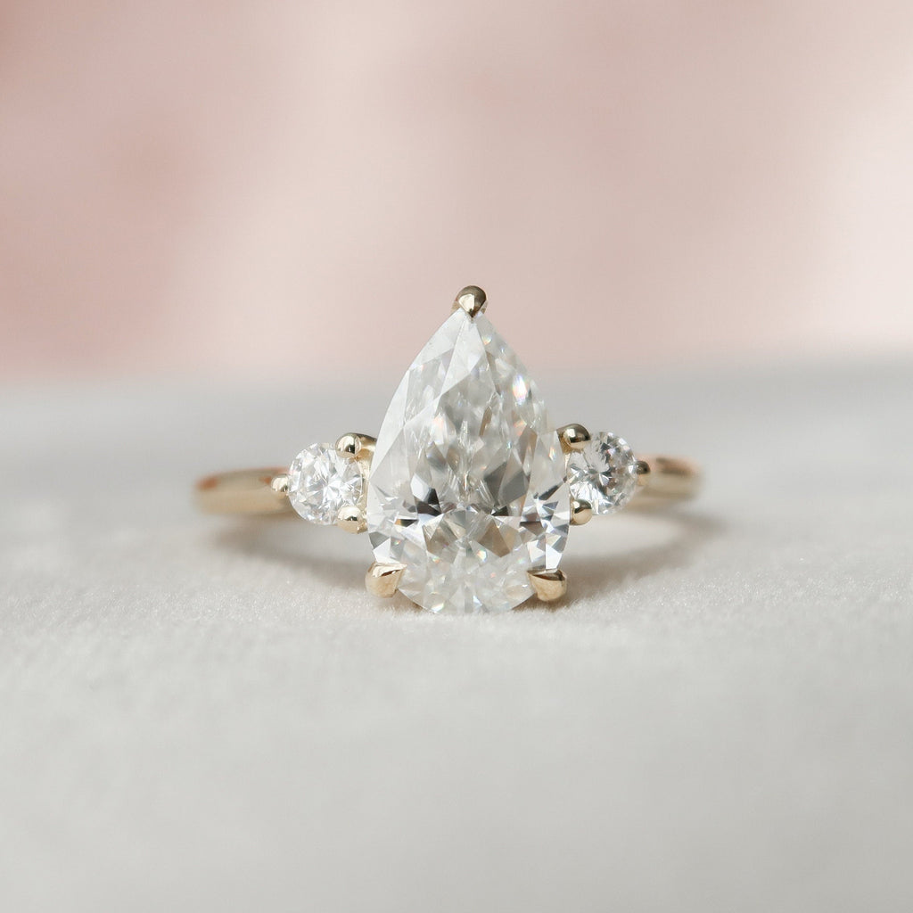 2.0 CT Pear Cut Moissanite Three Stone Engagement Ring