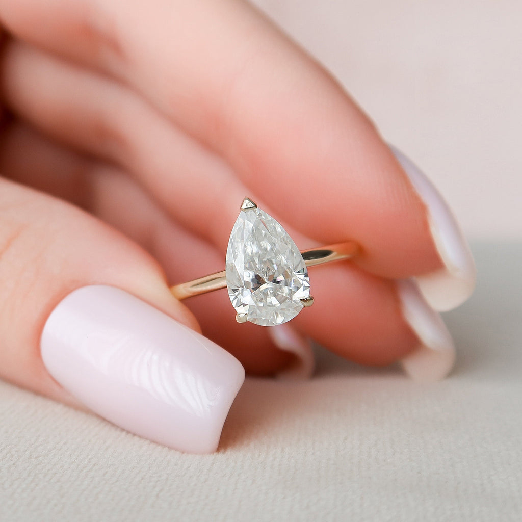 2.0CT Pear Moissanite Solitaire Engagement Ring With Hidden Halo Setting