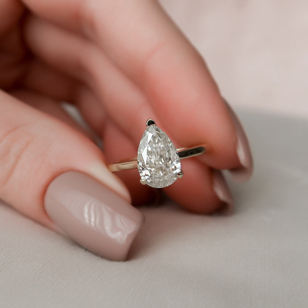 2.0CT Pear Moissanite Solitaire Engagement Ring With Hidden Halo Setting