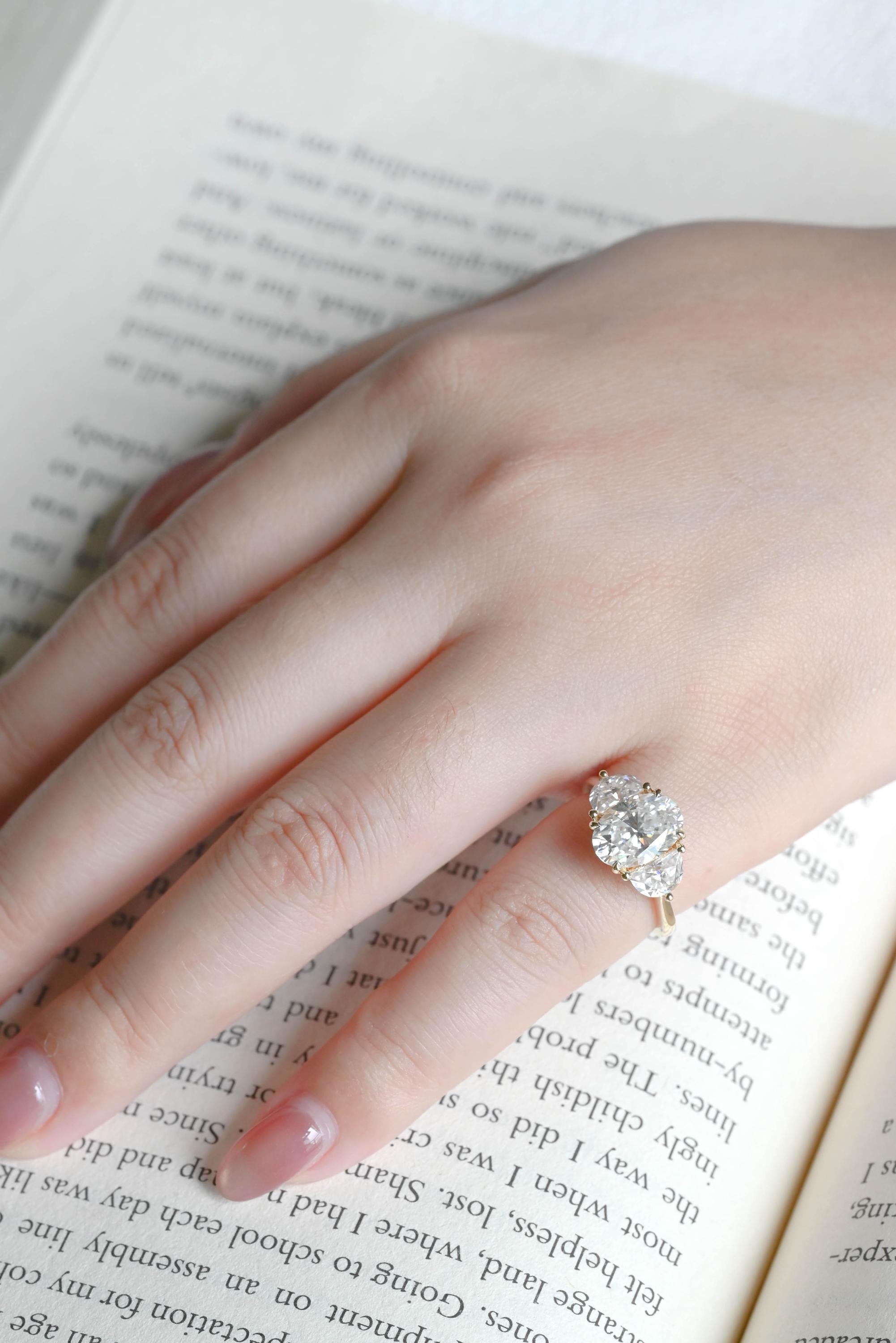 Solid Gold Oval Moissanite Engagement Ring with Half-moon Side Stones