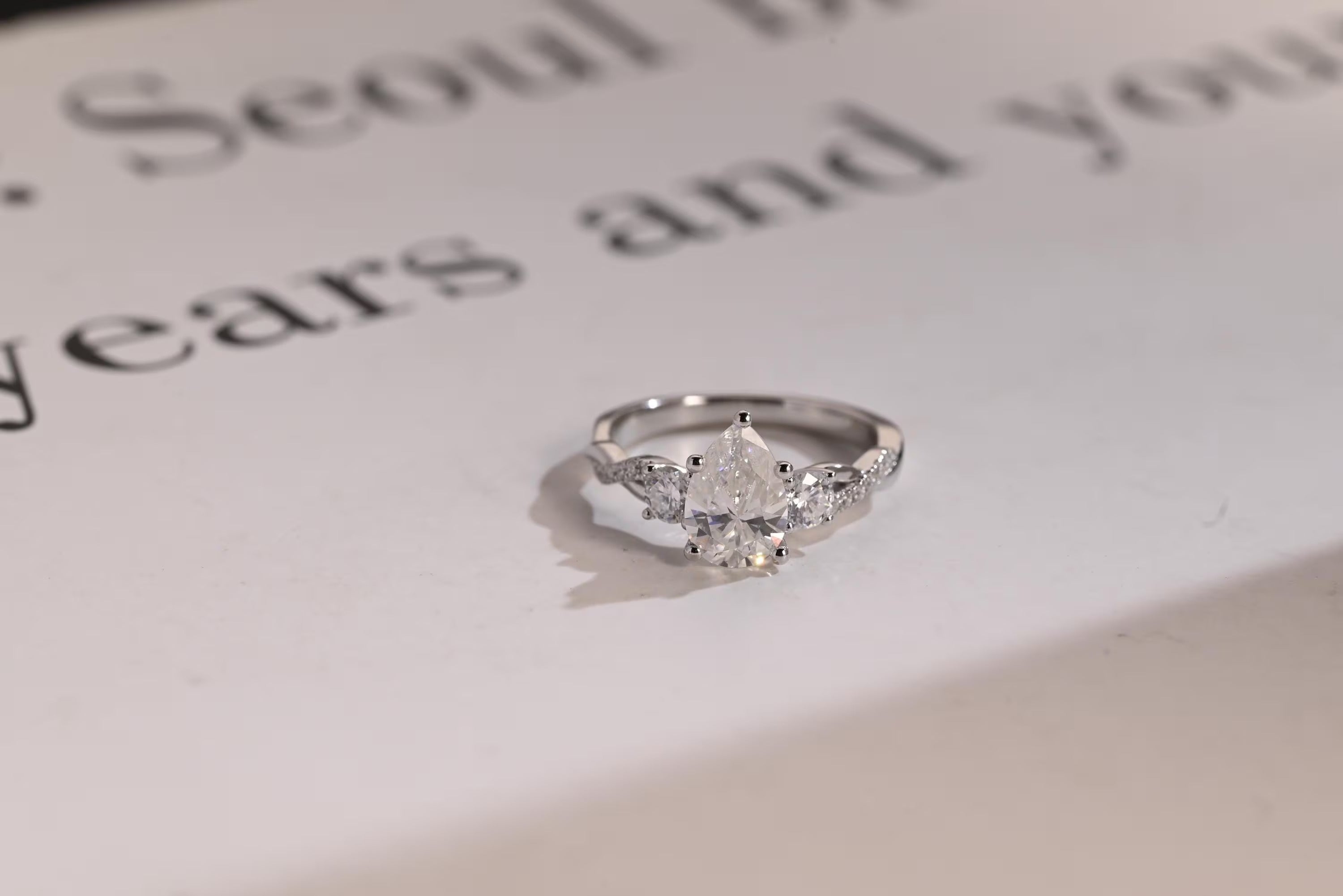 Solid Gold Pear Moissanite Engagement Ring, Twisted Band Half Eternity Bridal Ring Main image