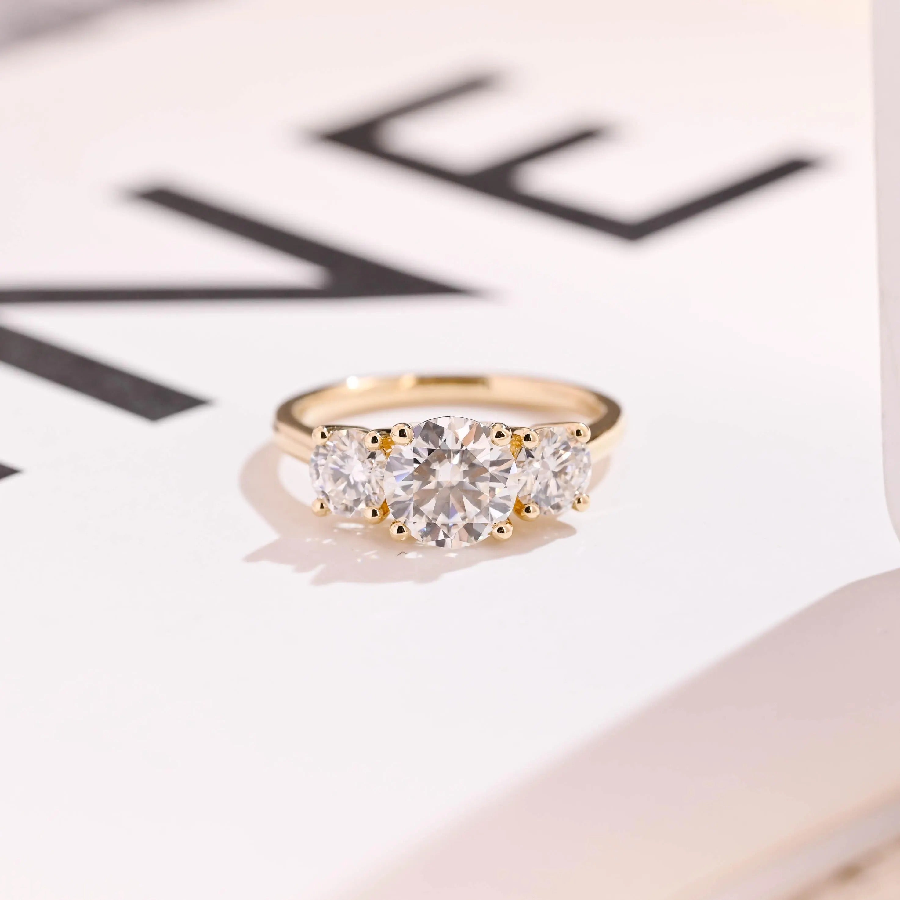 Solid Gold Three Stone Round Cut Moissanite Engagement Ring Main image