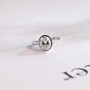 Solid Gold Oval Cut Crushed Ice Moissanite Engagement Ring with Bezel
