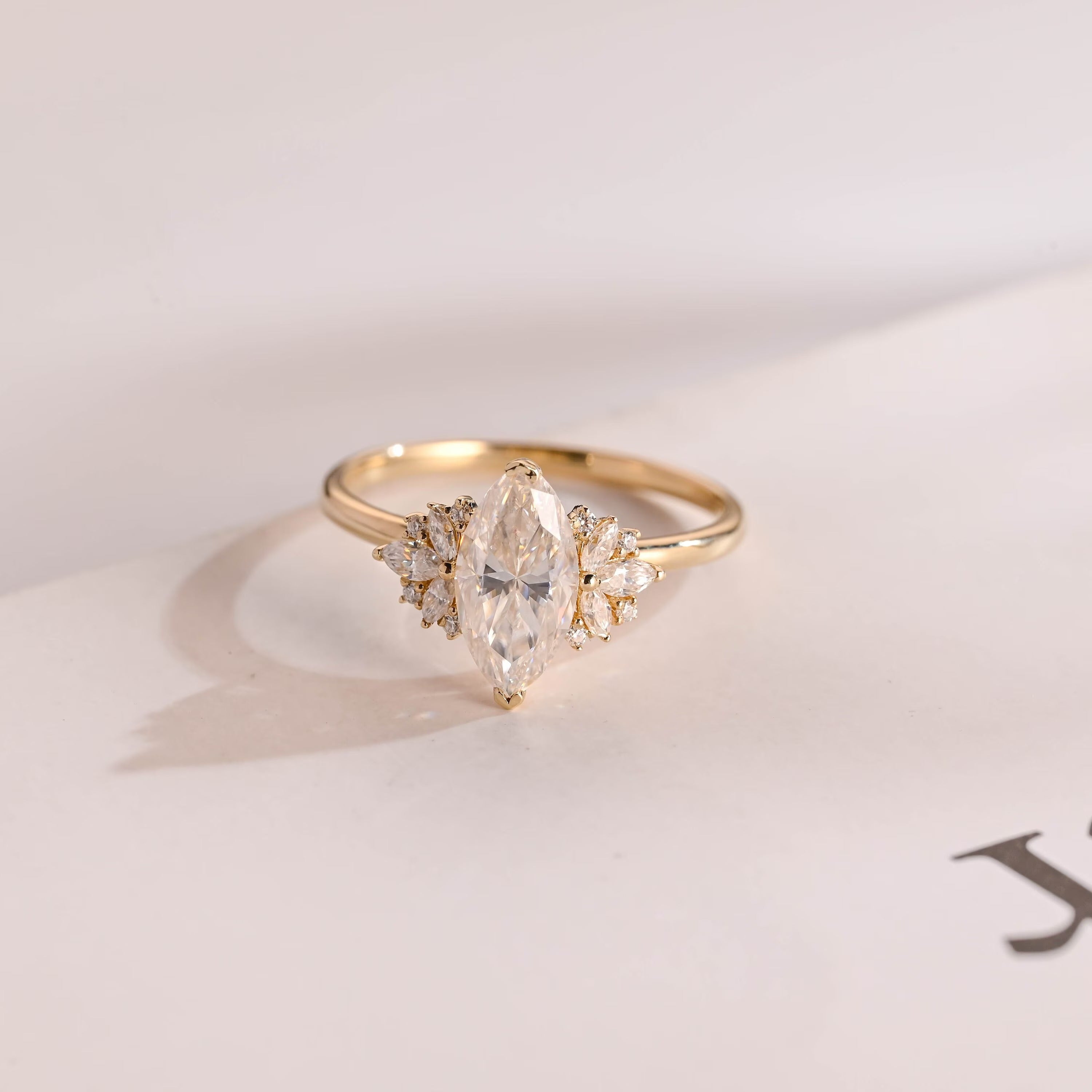Solid Gold Marquise Moissanite Engagement Ring with Accent Stones Main image