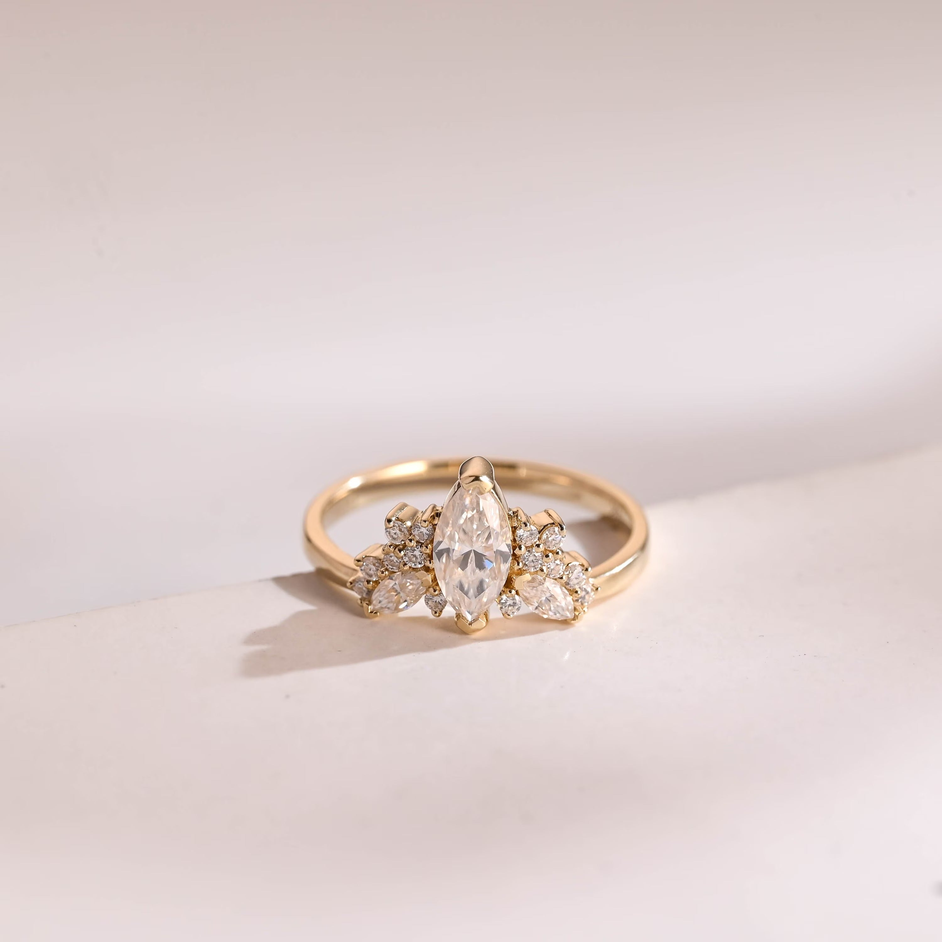 Solid Gold Marquise Moissanite Engagement Ring with Accent Stones Main image
