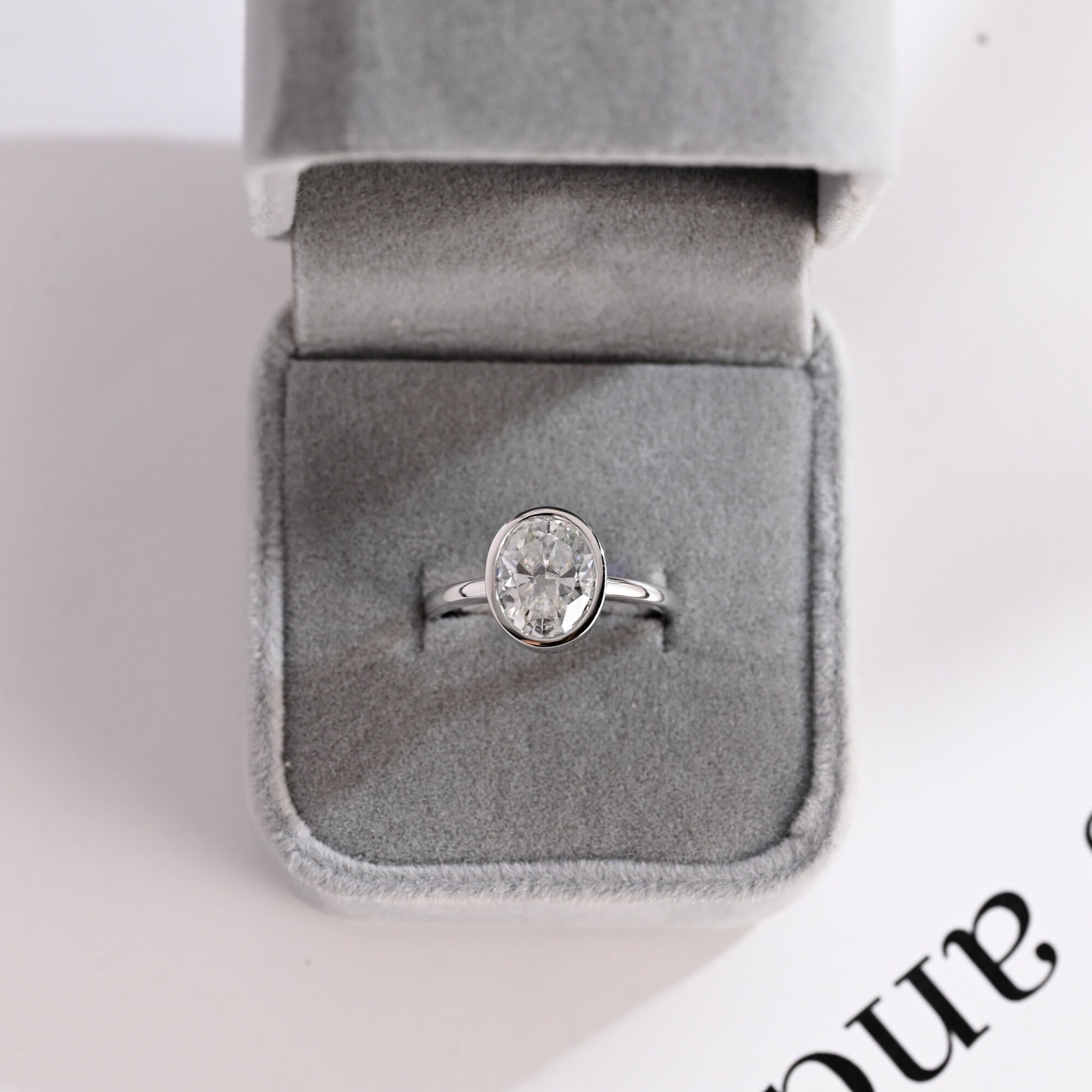 Solid Gold Oval Cut Crushed Ice Moissanite Engagement Ring with Bezel