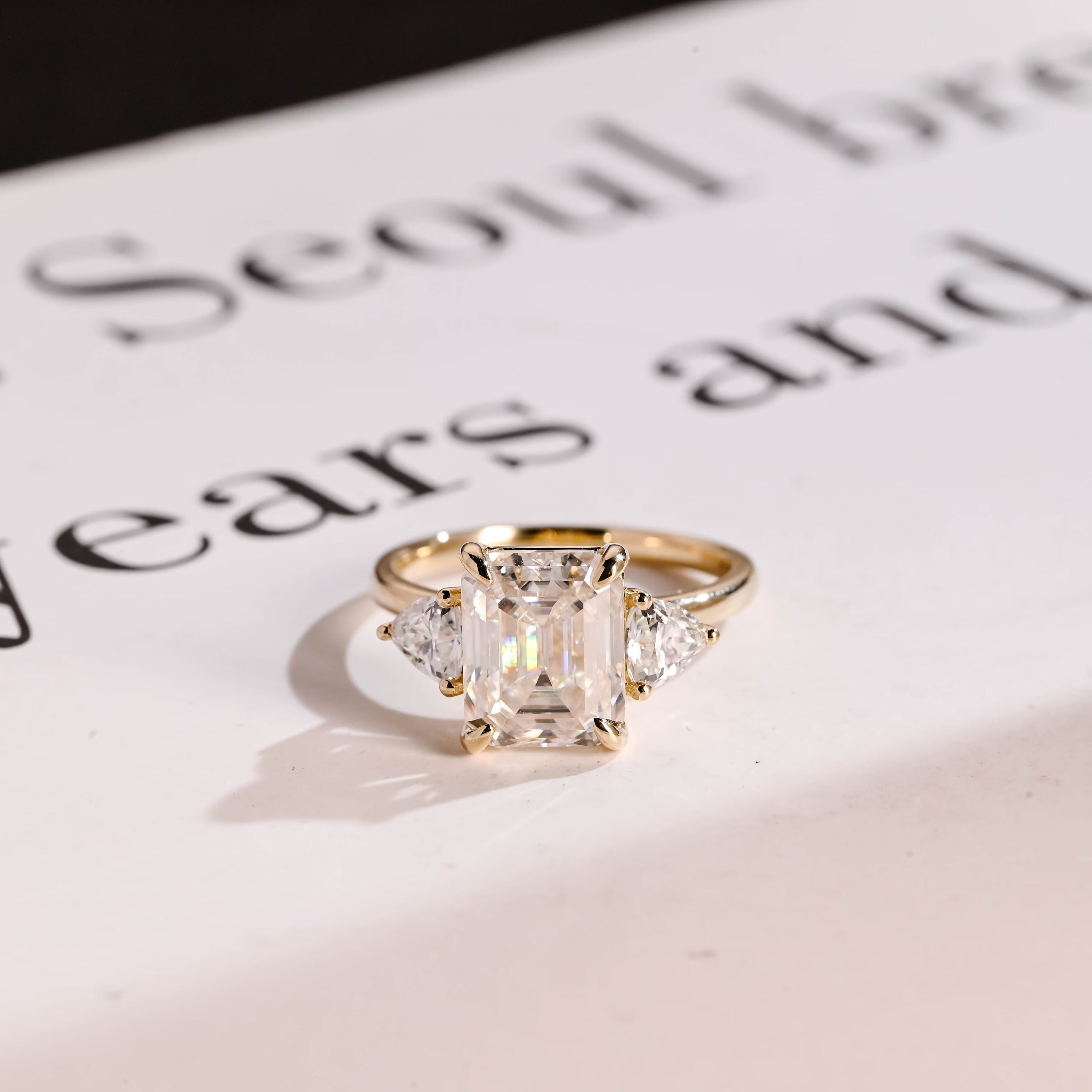 Solid Gold Emerald Cut Moissanite Engagement Ring With Trillion Accent, Three Stone Ring Main image
