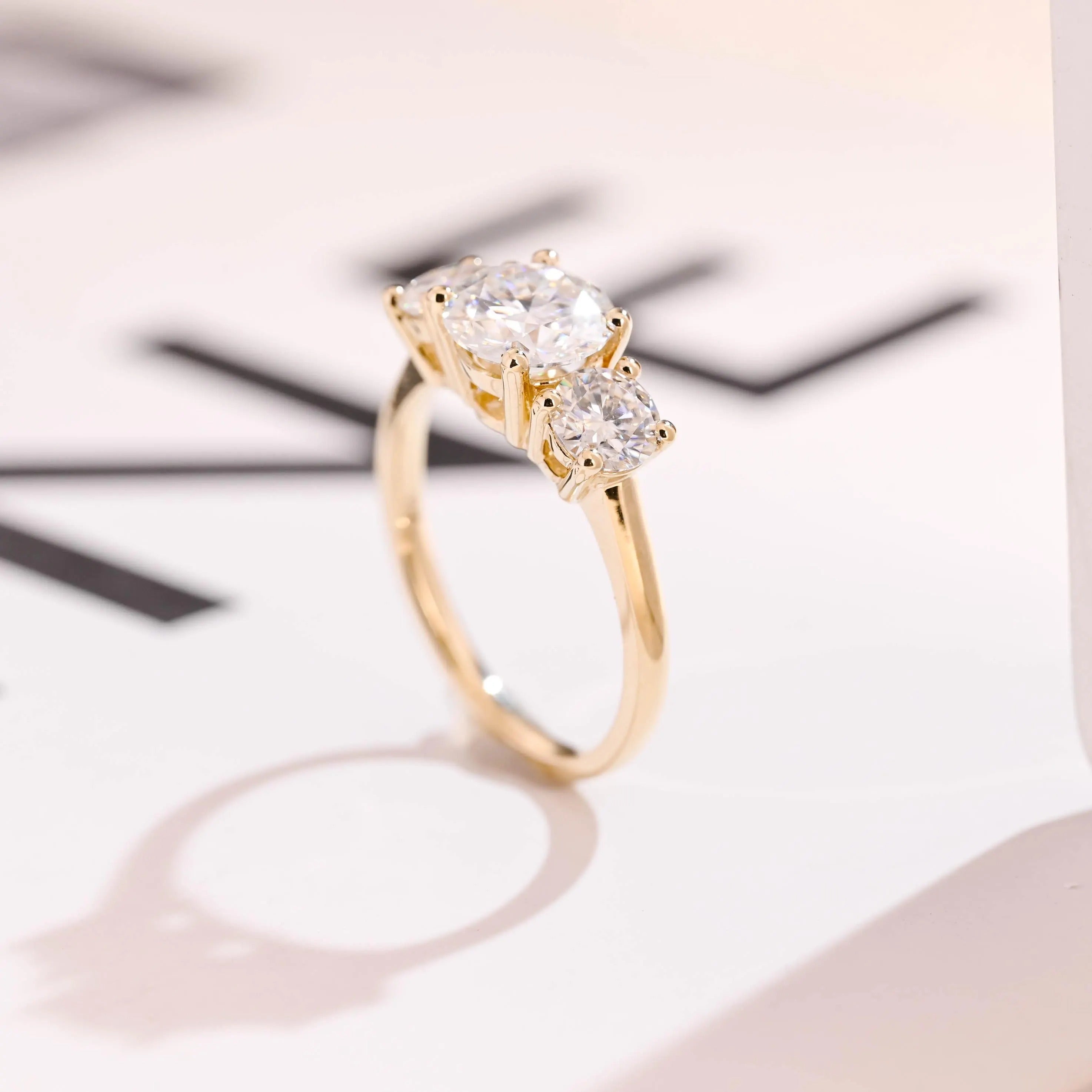 Solid Gold Three Stone Round Cut Moissanite Engagement Ring Secondary image