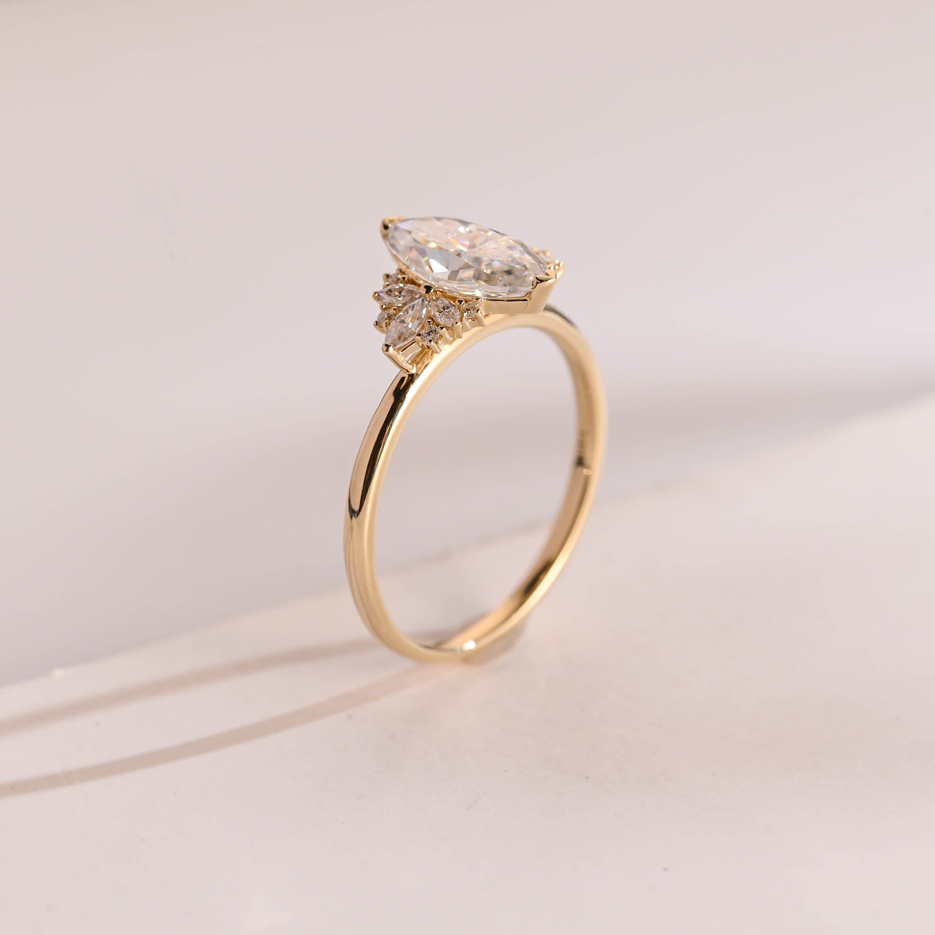 Solid Gold Marquise Moissanite Engagement Ring with Accent Stones