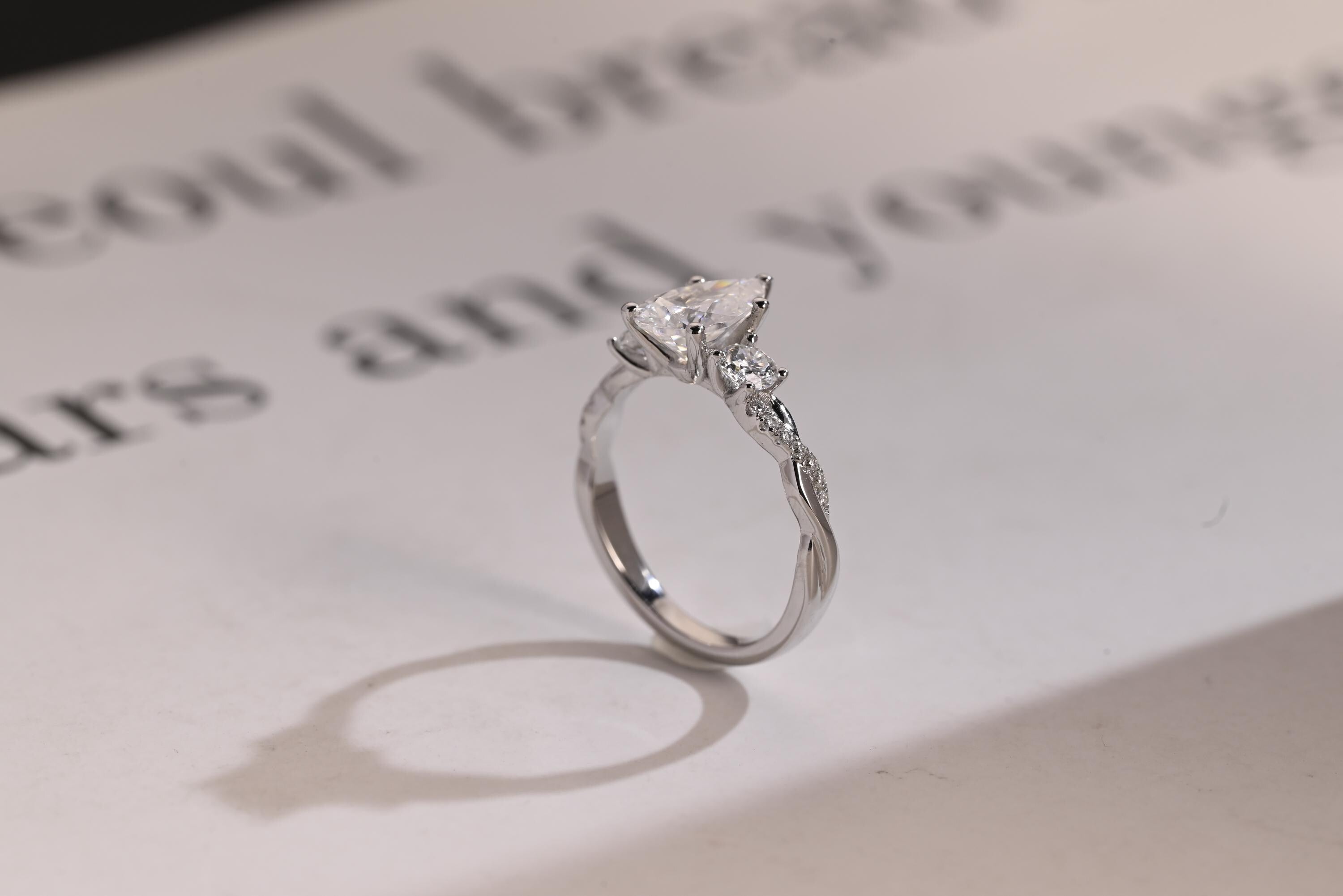 Solid Gold Pear Moissanite Engagement Ring, Twisted Band Half Eternity Bridal Ring Secondary image