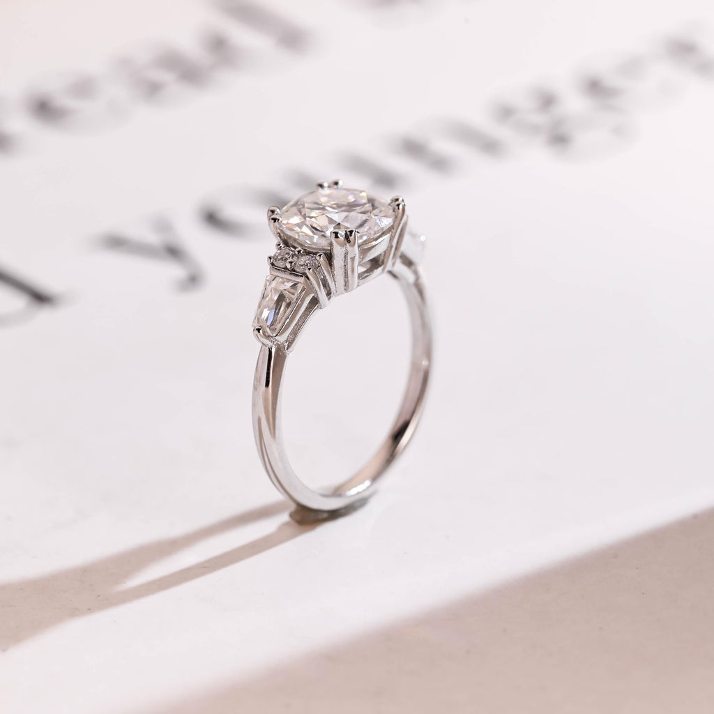 Solid Gold Round Cut Moissanite Engagement Ring with Trapezoid Accent