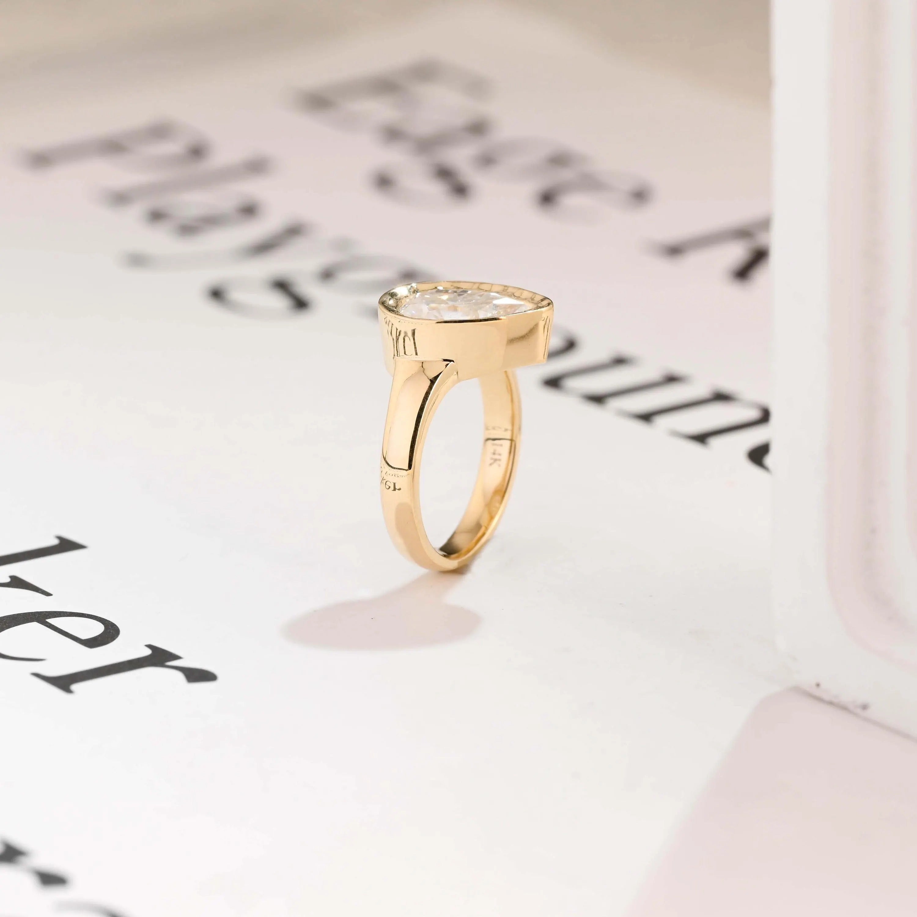 Solid Gold Pear Moissanite Engagement Ring with Bezel, Minimalist Hammer Ring Secondary image