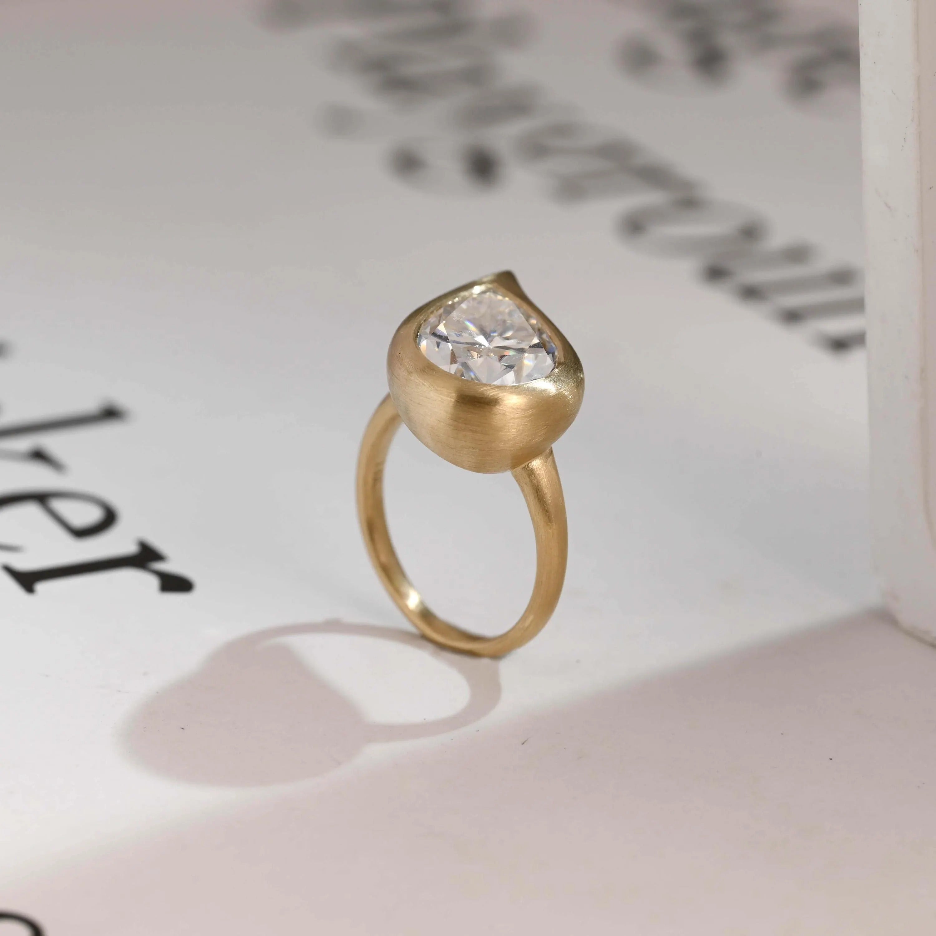 Solid Gold Pear Moissanite Engagement Ring, Bezel Set Brushed Finish