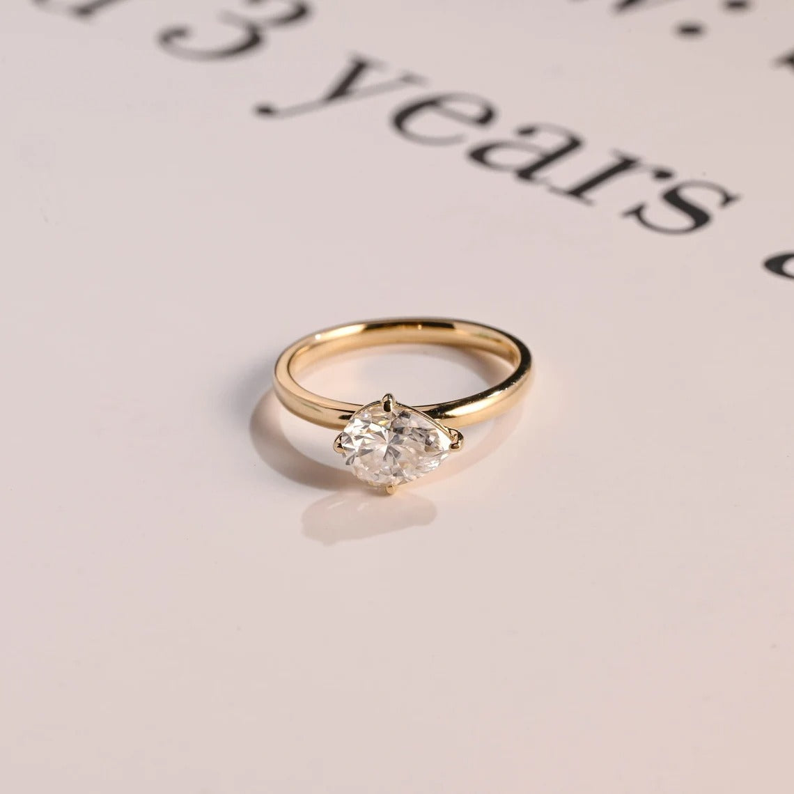 Solid Gold East-West Pear Moissanite Engagement Ring Main image