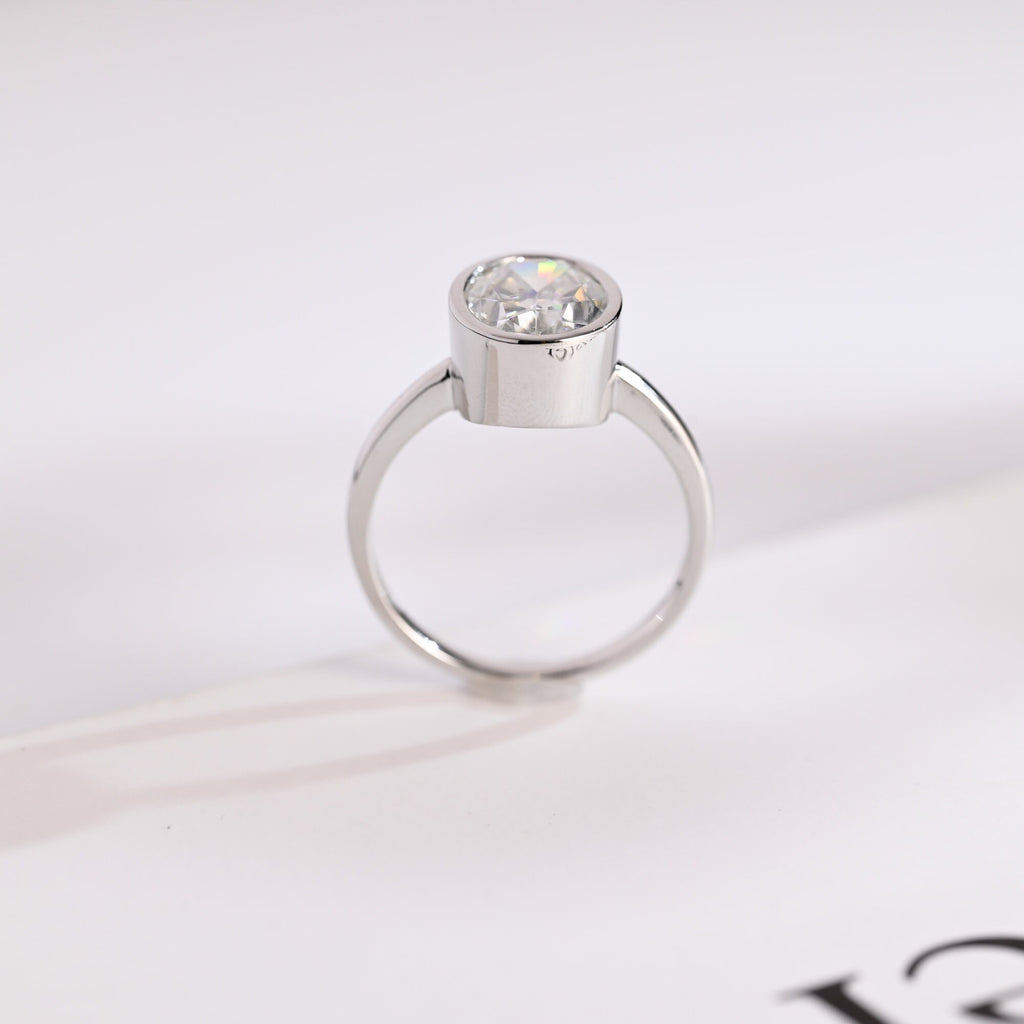 Solid Gold Oval Cut Crushed Ice Moissanite Engagement Ring with Bezel