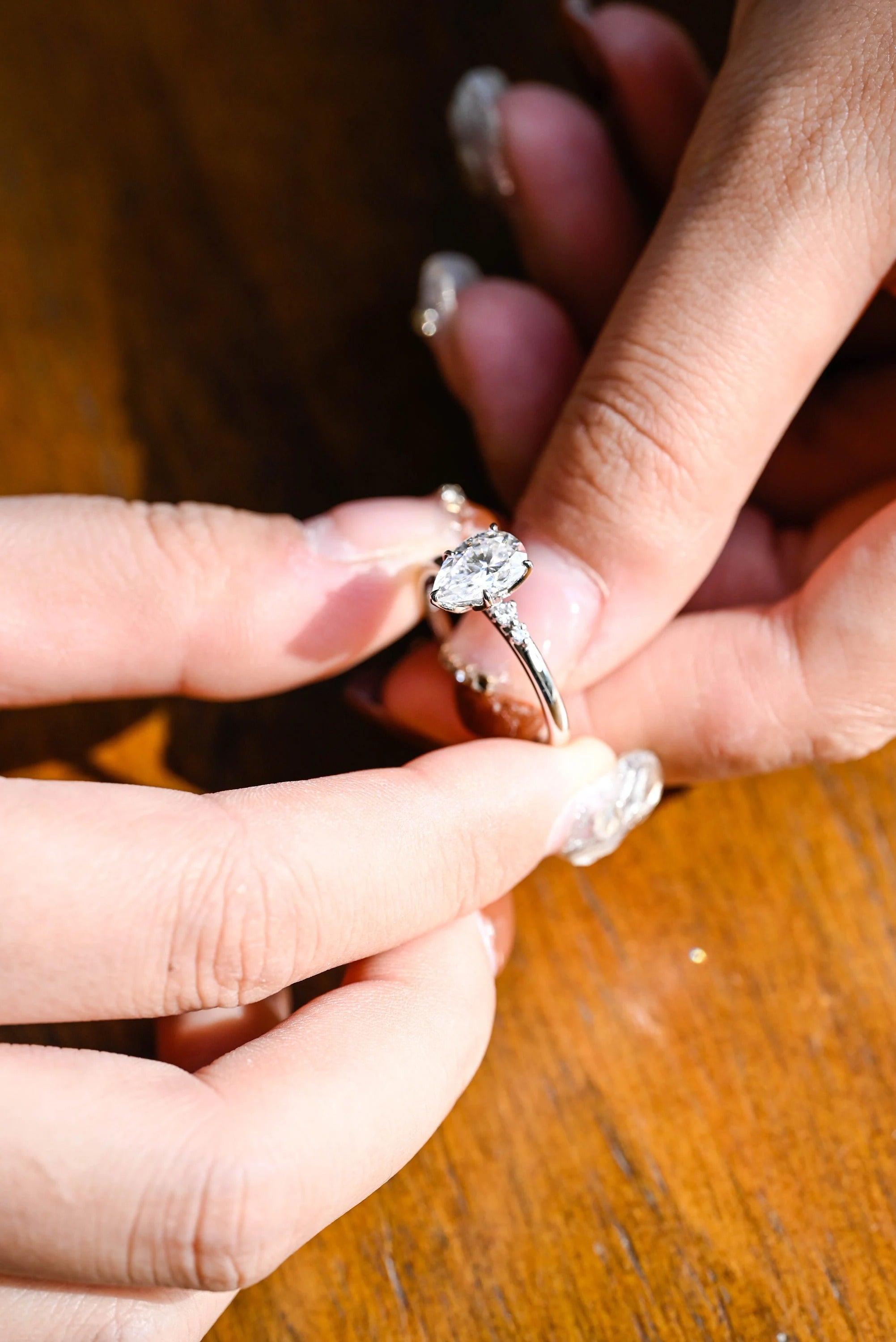 Solid Gold Pear Cut Moissanite Engagement Ring with Side Stone