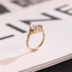 Solid Gold Twisted Band Oval Moissanite Engagement Ring
