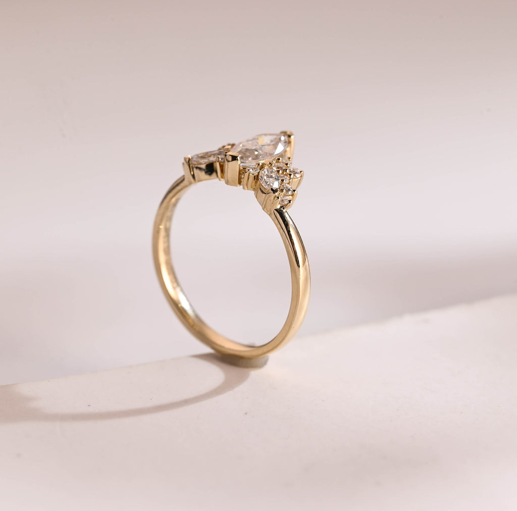 Solid Gold Marquise Moissanite Engagement Ring with Accent Stones