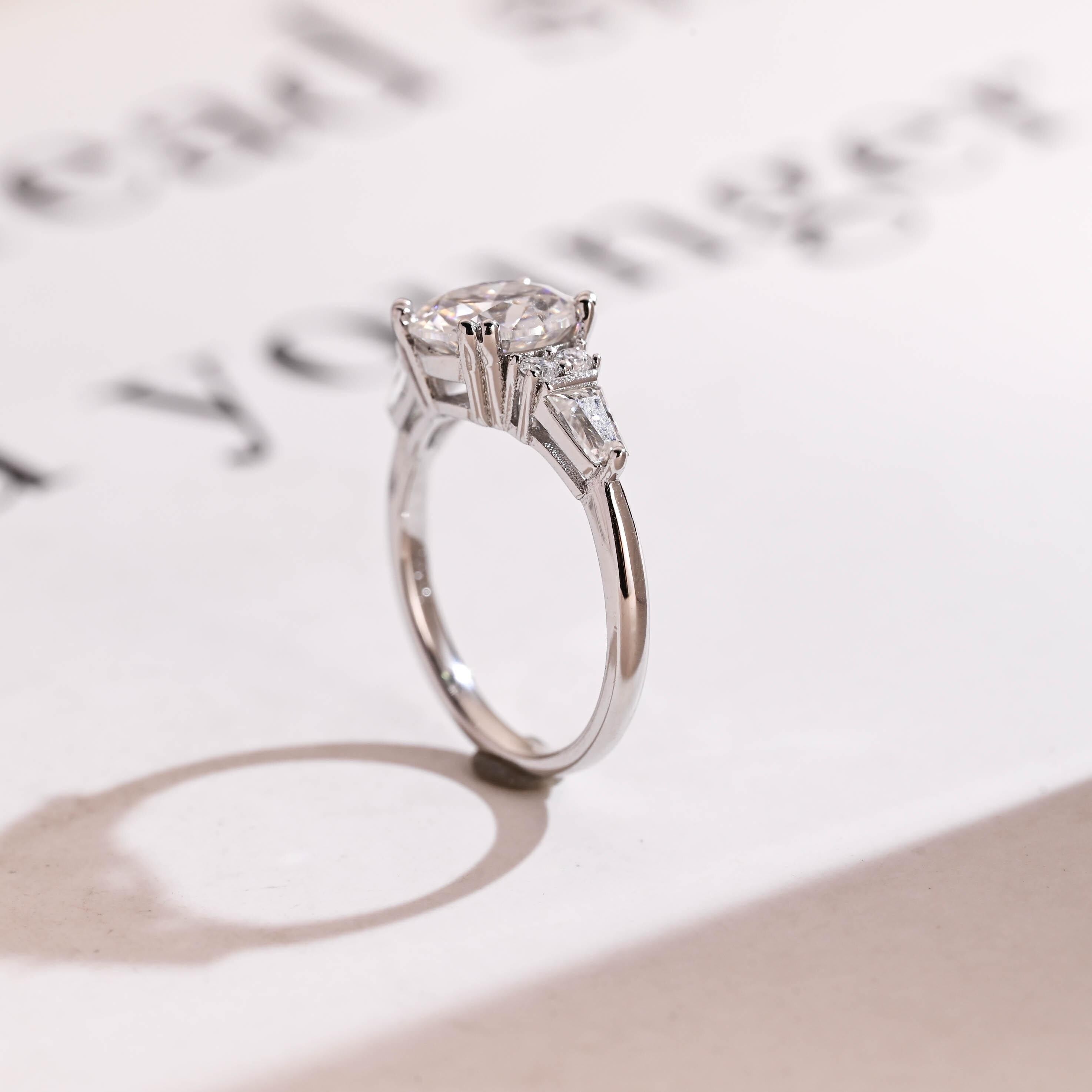 Solid Gold Round Cut Moissanite Engagement Ring with Trapezoid Accent Secondary image
