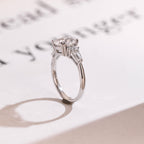 Solid Gold Round Cut Moissanite Engagement Ring with Trapezoid Accent