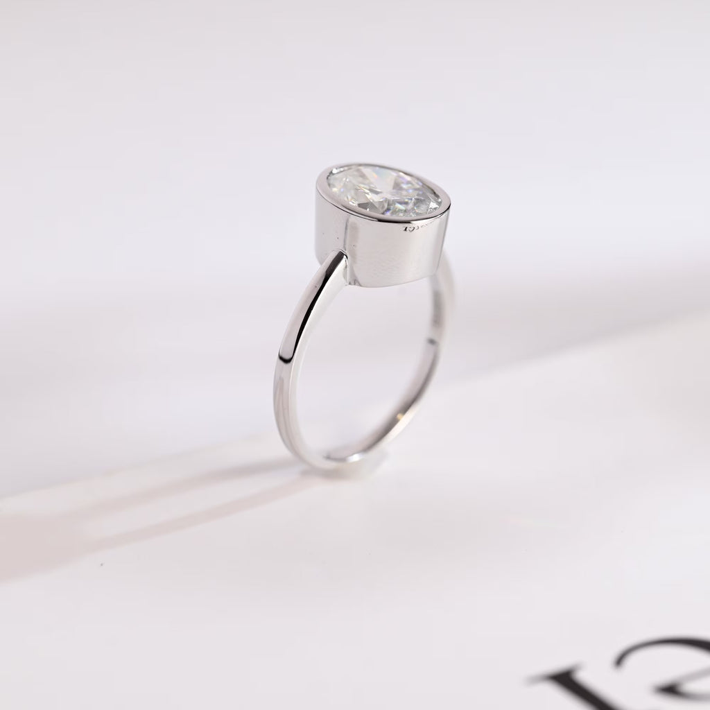 Solid Gold Oval Cut Crushed Ice Moissanite Engagement Ring with Bezel