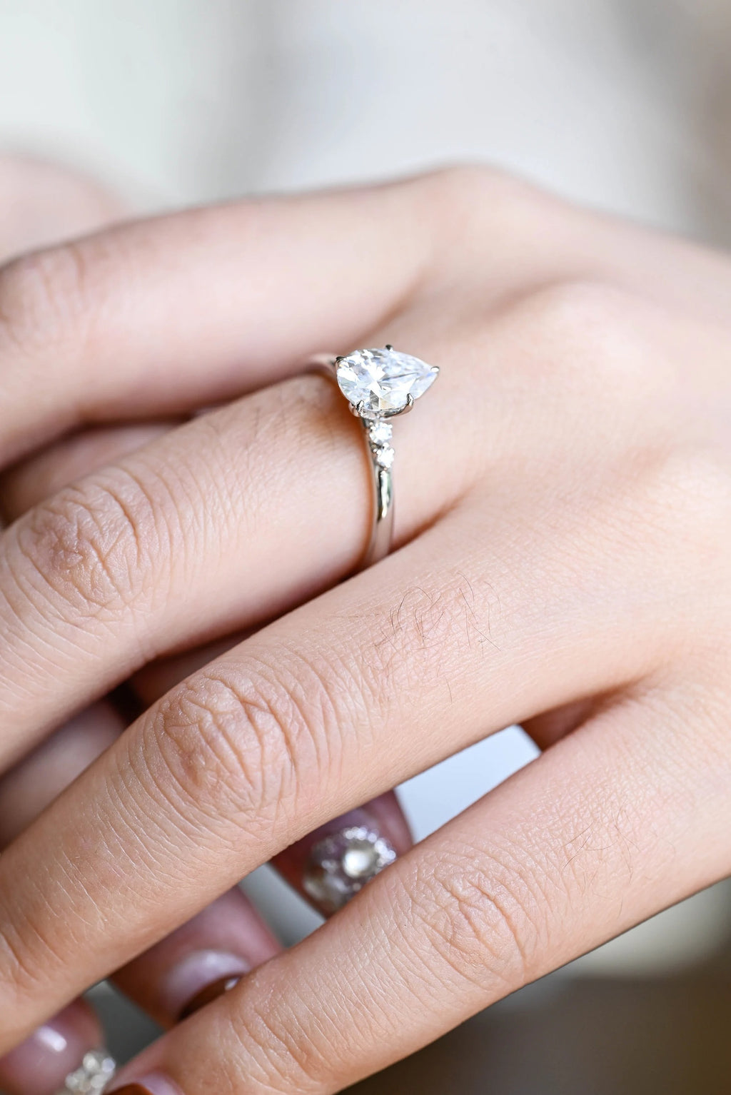 Solid Gold Pear Cut Moissanite Engagement Ring with Side Stone