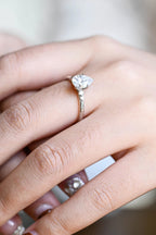 Solid Gold Pear Cut Moissanite Engagement Ring with Side Stone