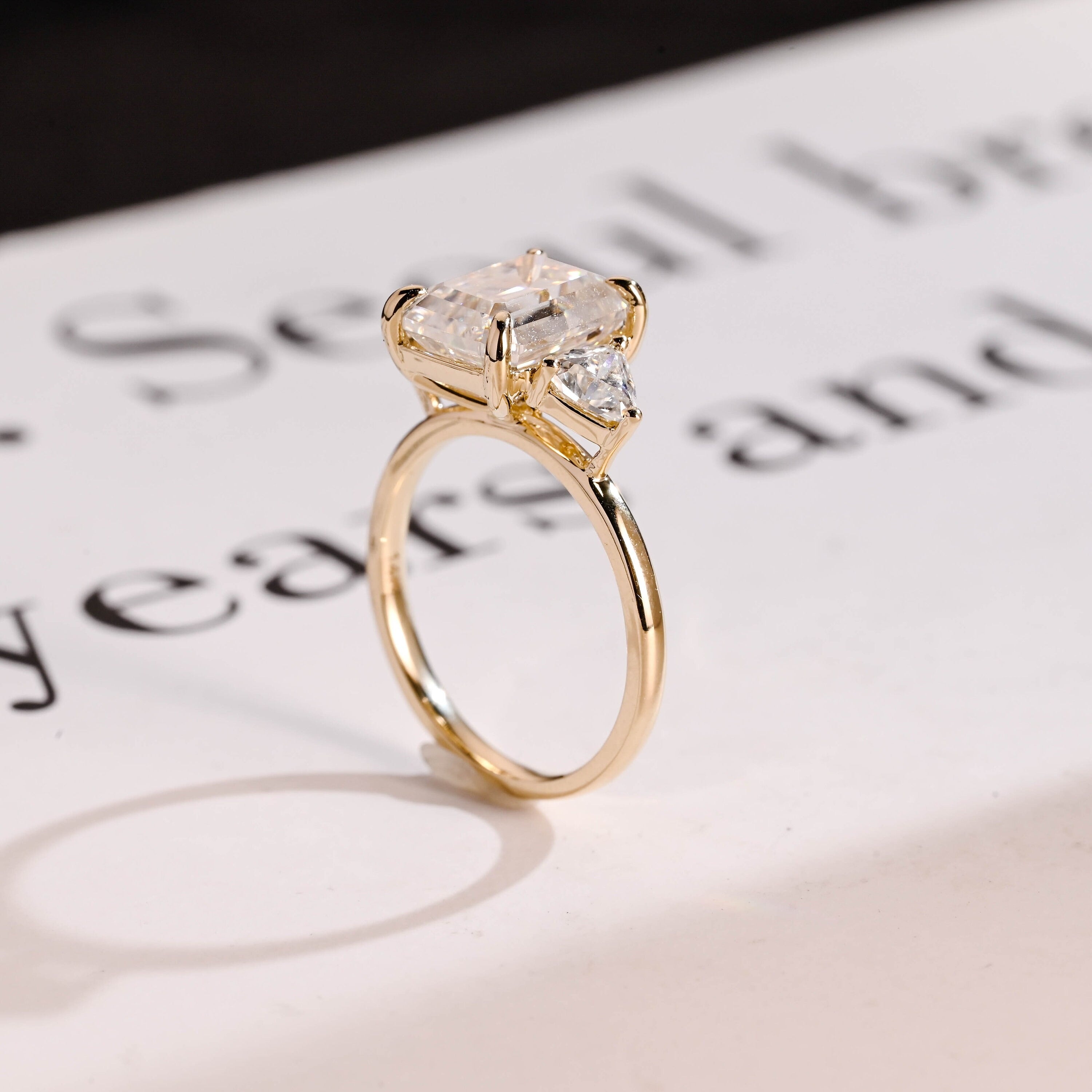 Solid Gold Emerald Cut Moissanite Engagement Ring With Trillion Accent, Three Stone Ring