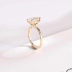Solid Gold Minimalist Pear Moissanite Engagement Ring