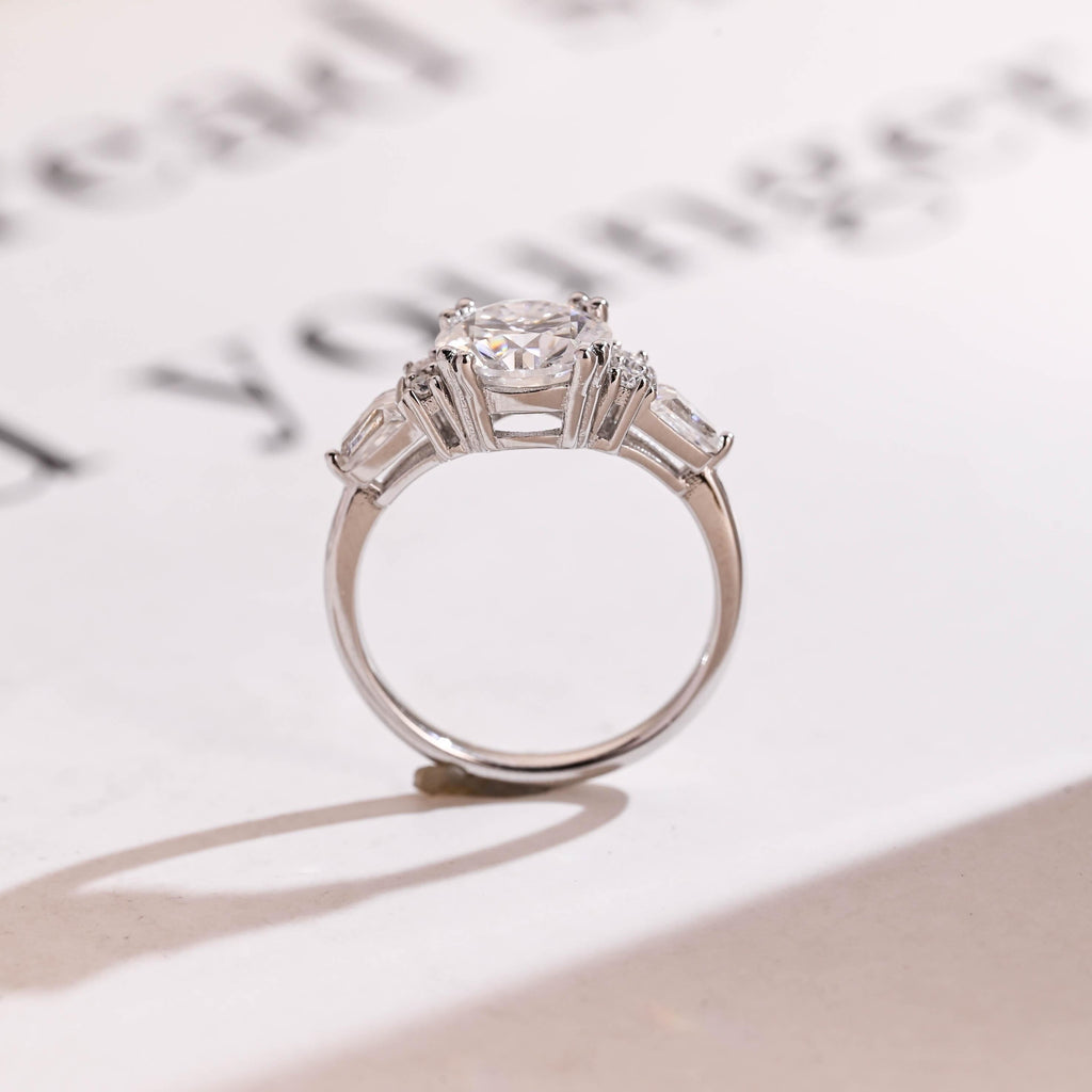Solid Gold Round Cut Moissanite Engagement Ring with Trapezoid Accent