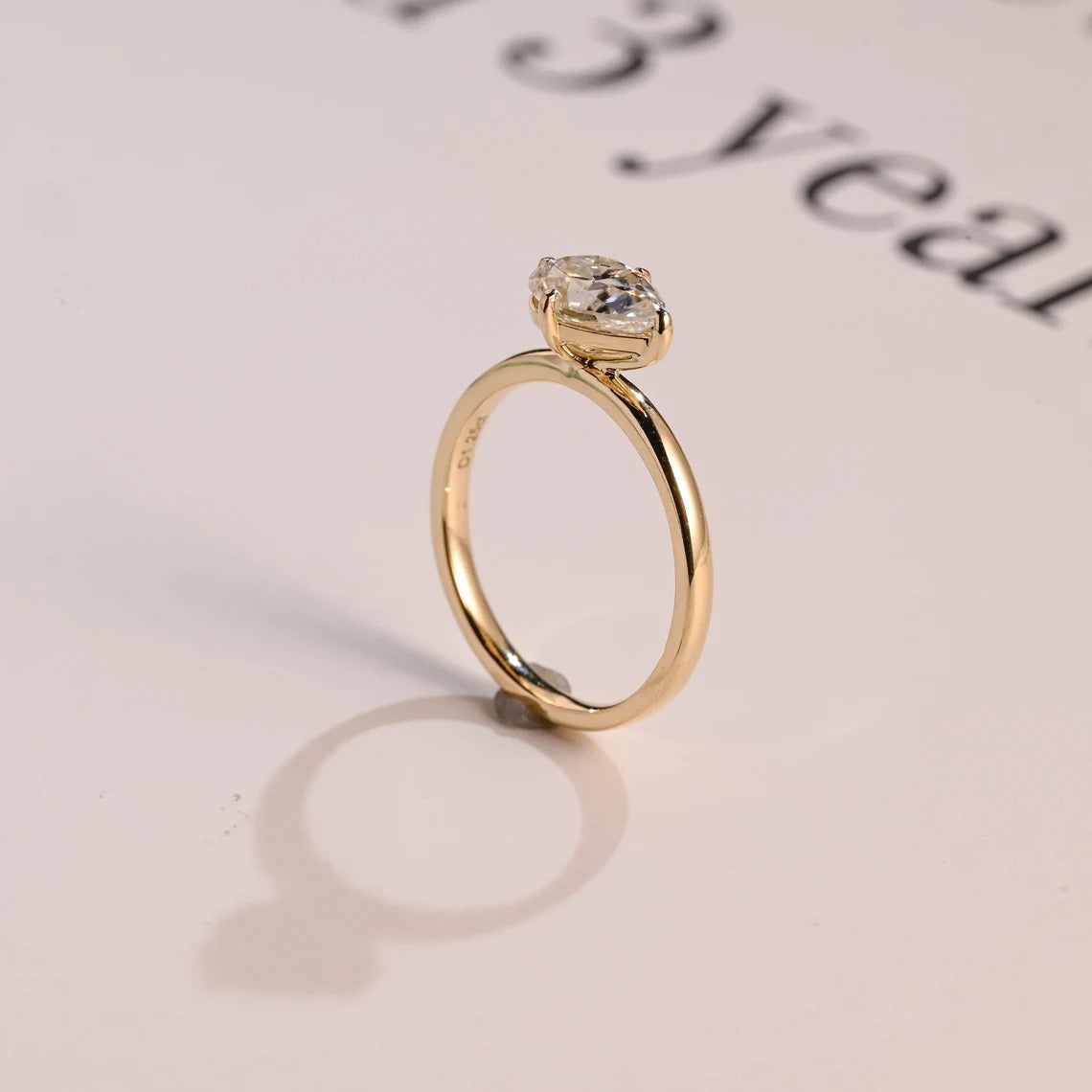 Solid Gold East-West Pear Moissanite Engagement Ring Secondary image