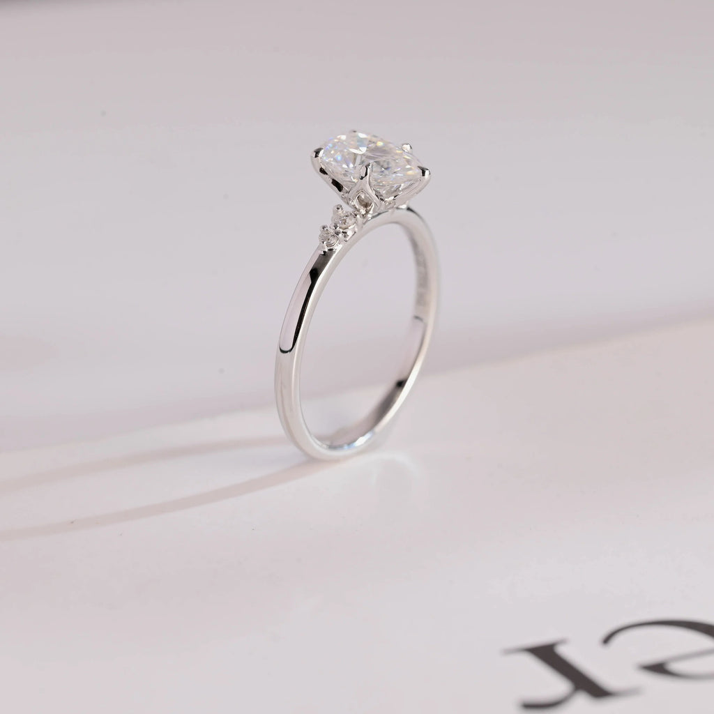 Solid Gold Pear Cut Moissanite Engagement Ring with Side Stone
