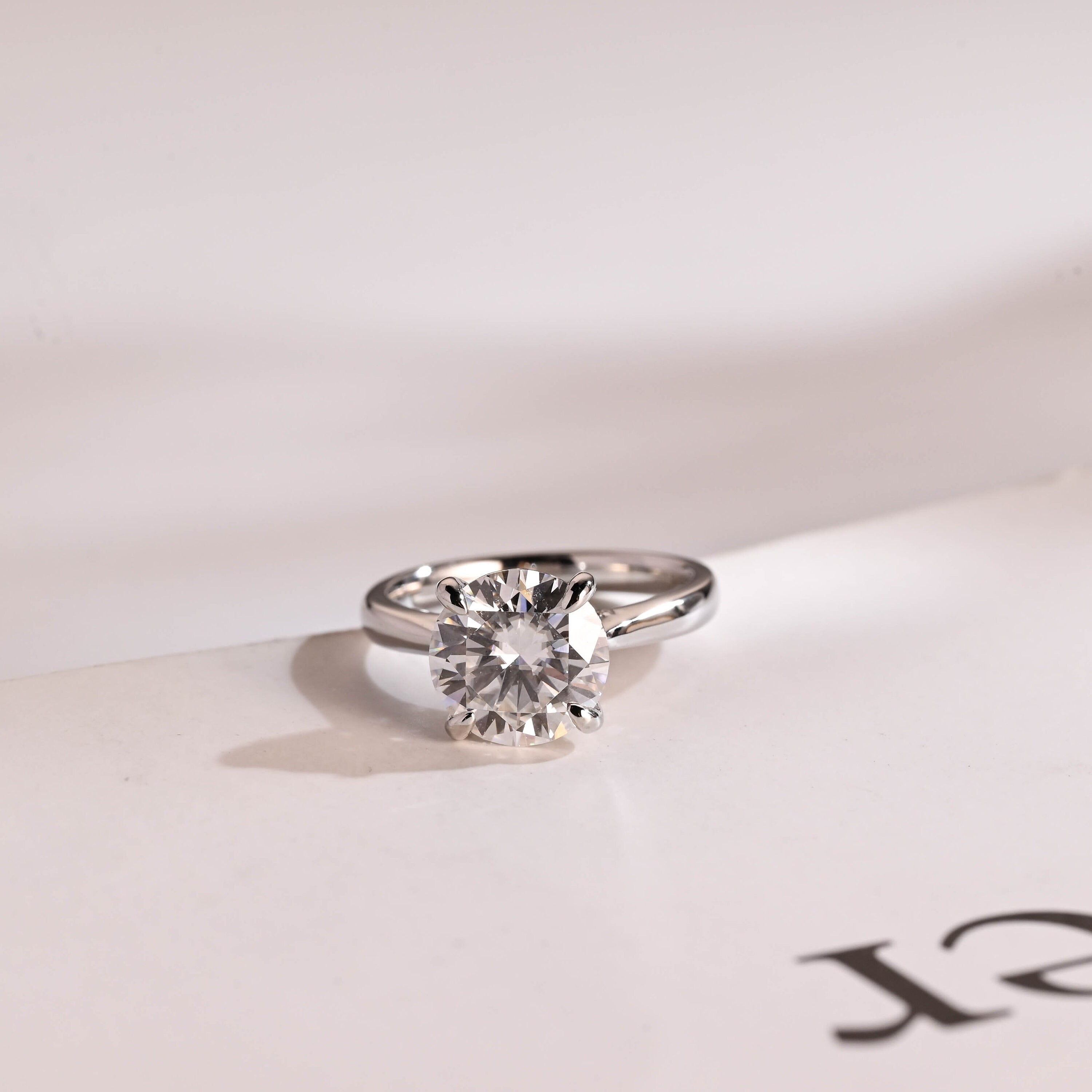 Solid Gold Round Cut Moissanite Engagement Ring with Hidden Halo Main image