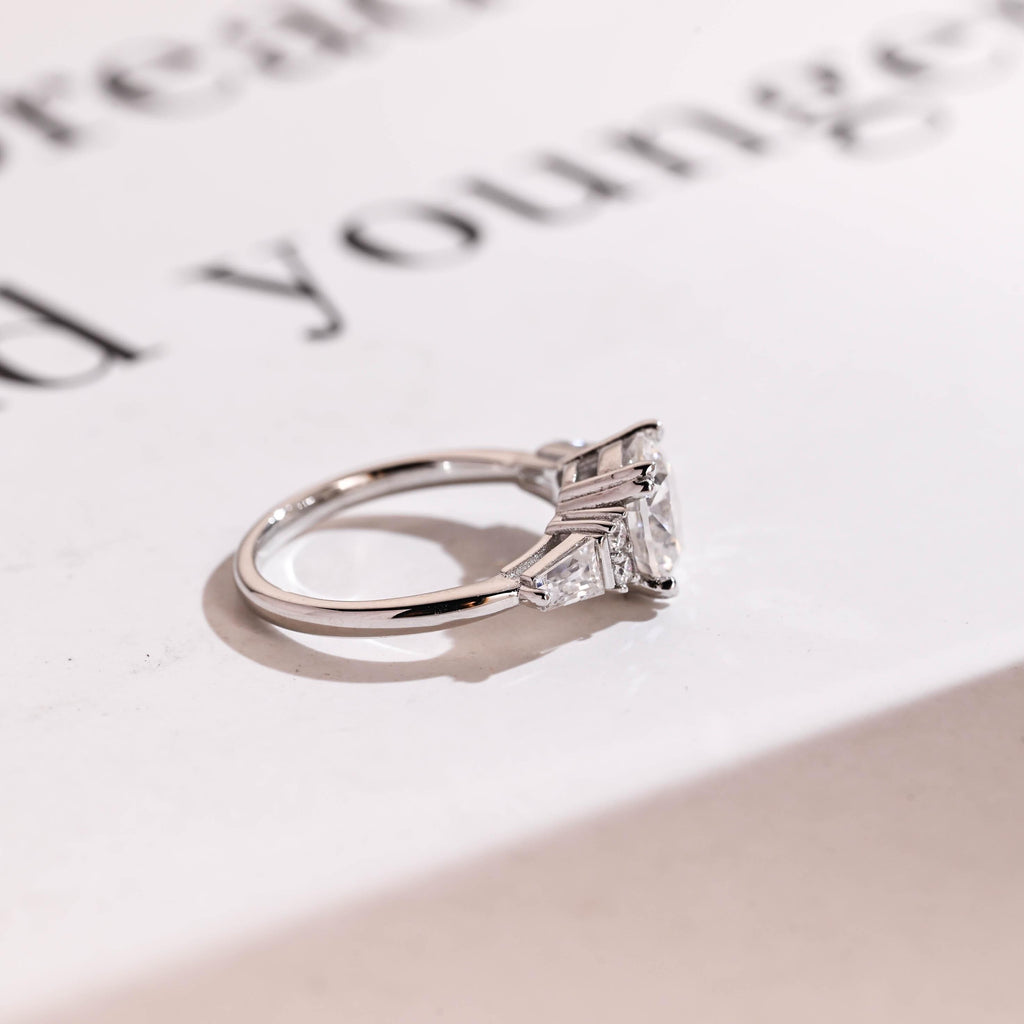 Solid Gold Round Cut Moissanite Engagement Ring with Trapezoid Accent